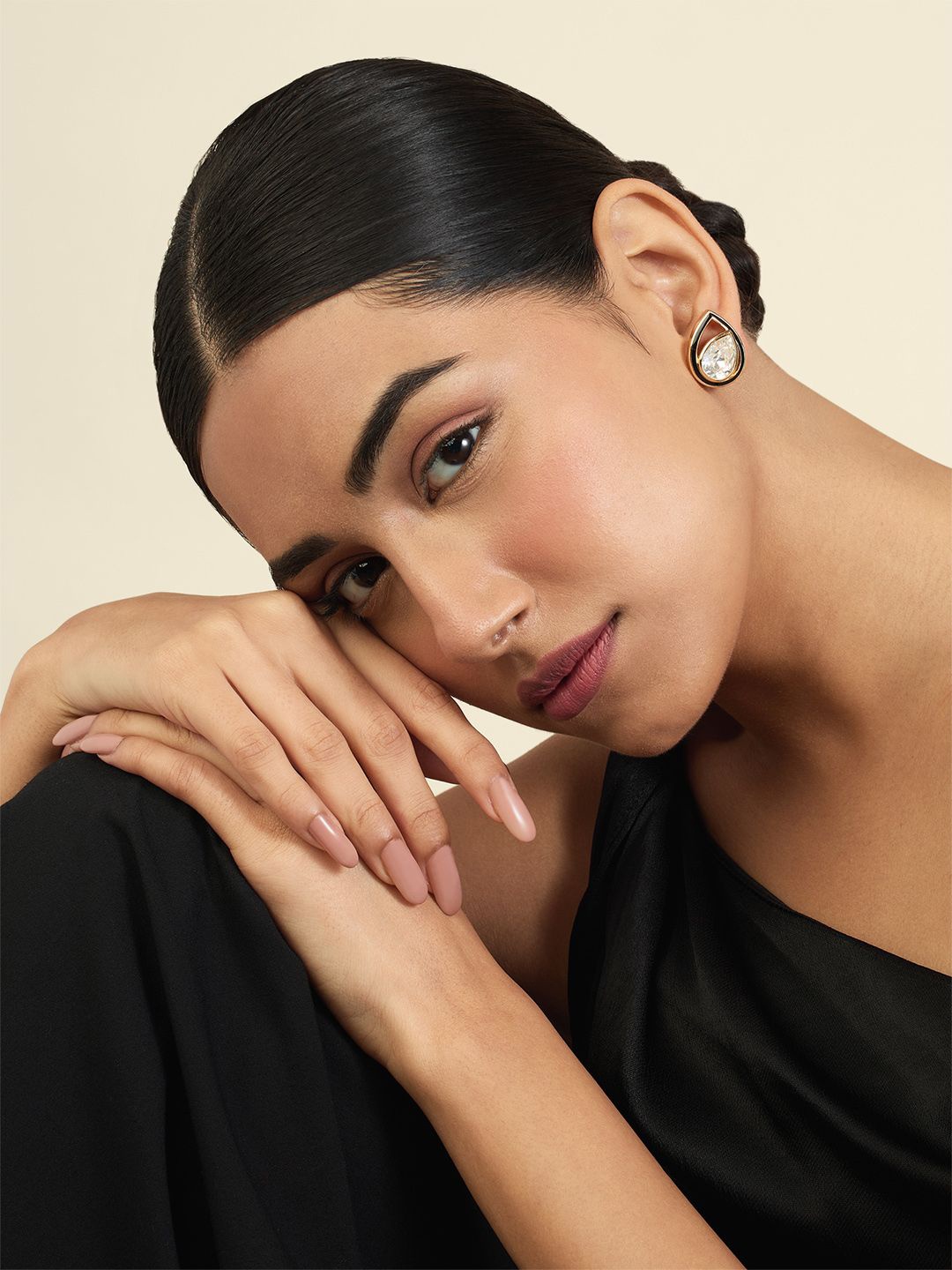 

Isharya 18KT Gold Plated Crystals Studded Teardrop Shaped Studs