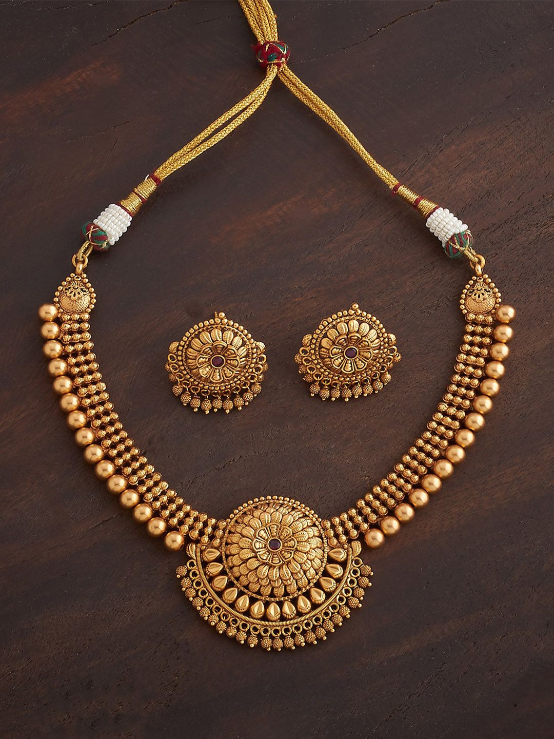 

Kushal's Fashion Jewellery Ruby Gold-Plated Ethnic Antique Jewellery Set