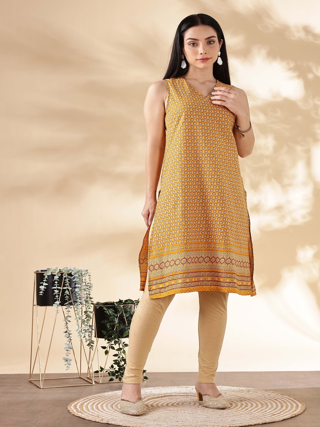 

Anouk Ethnic Motifs Printed V-Neck Thread Work Kalamkari Straight Kurta, Mustard