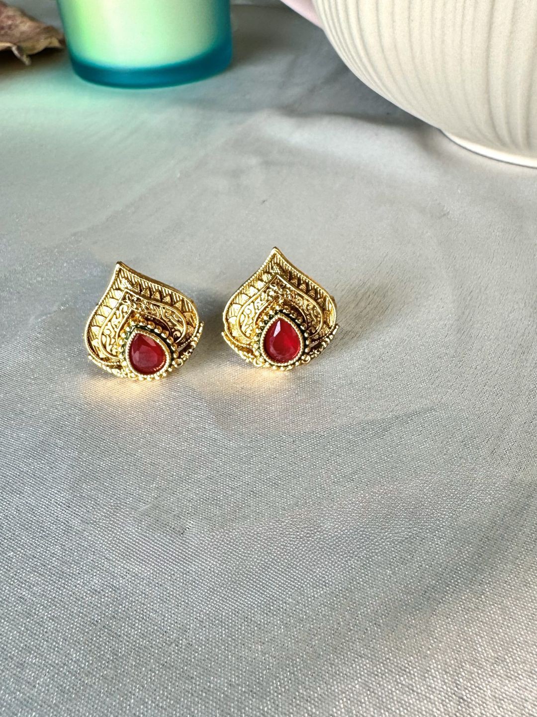 

The Jewellery Tale Gold-Plated Stones Studded Pan Shaped Studs