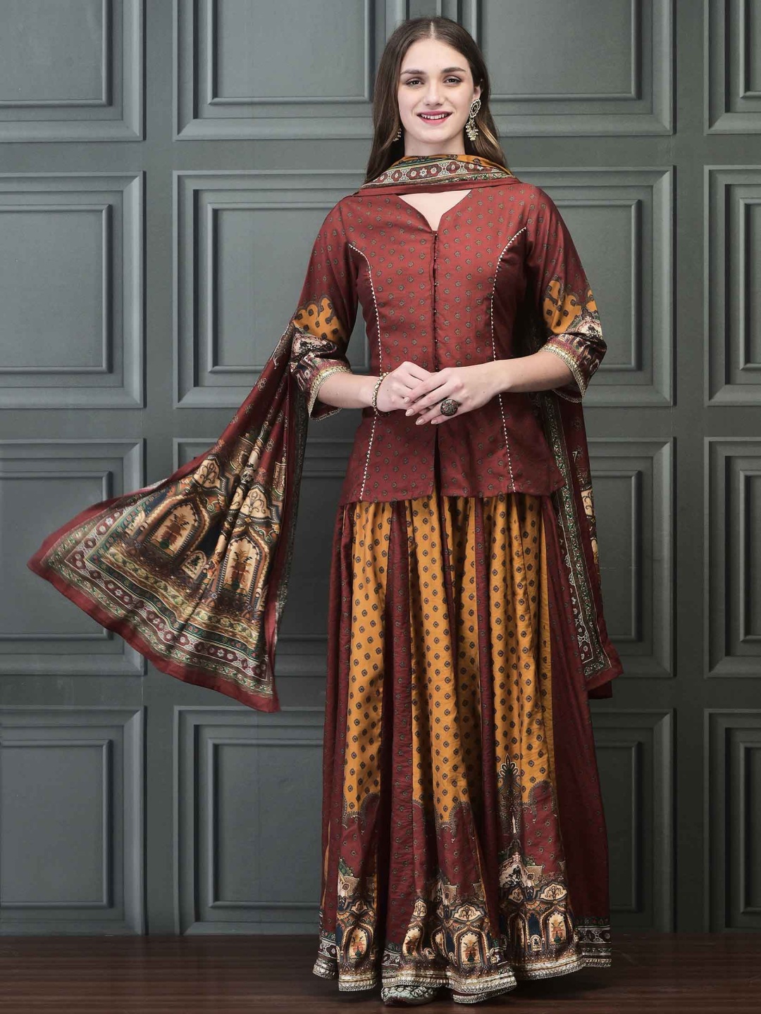 

Shree Women Paisley Printed Regular Chanderi Silk Kurti with Skirt & With Dupatta, Rust