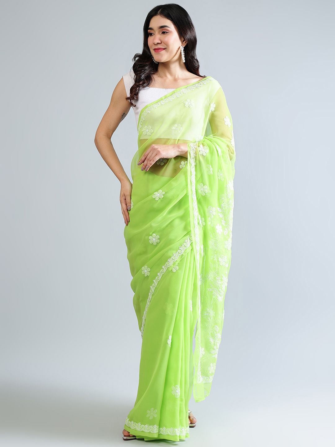 

Seva Chikan Ethnic Motifs Embroidered Poly Georgette Saree, Green