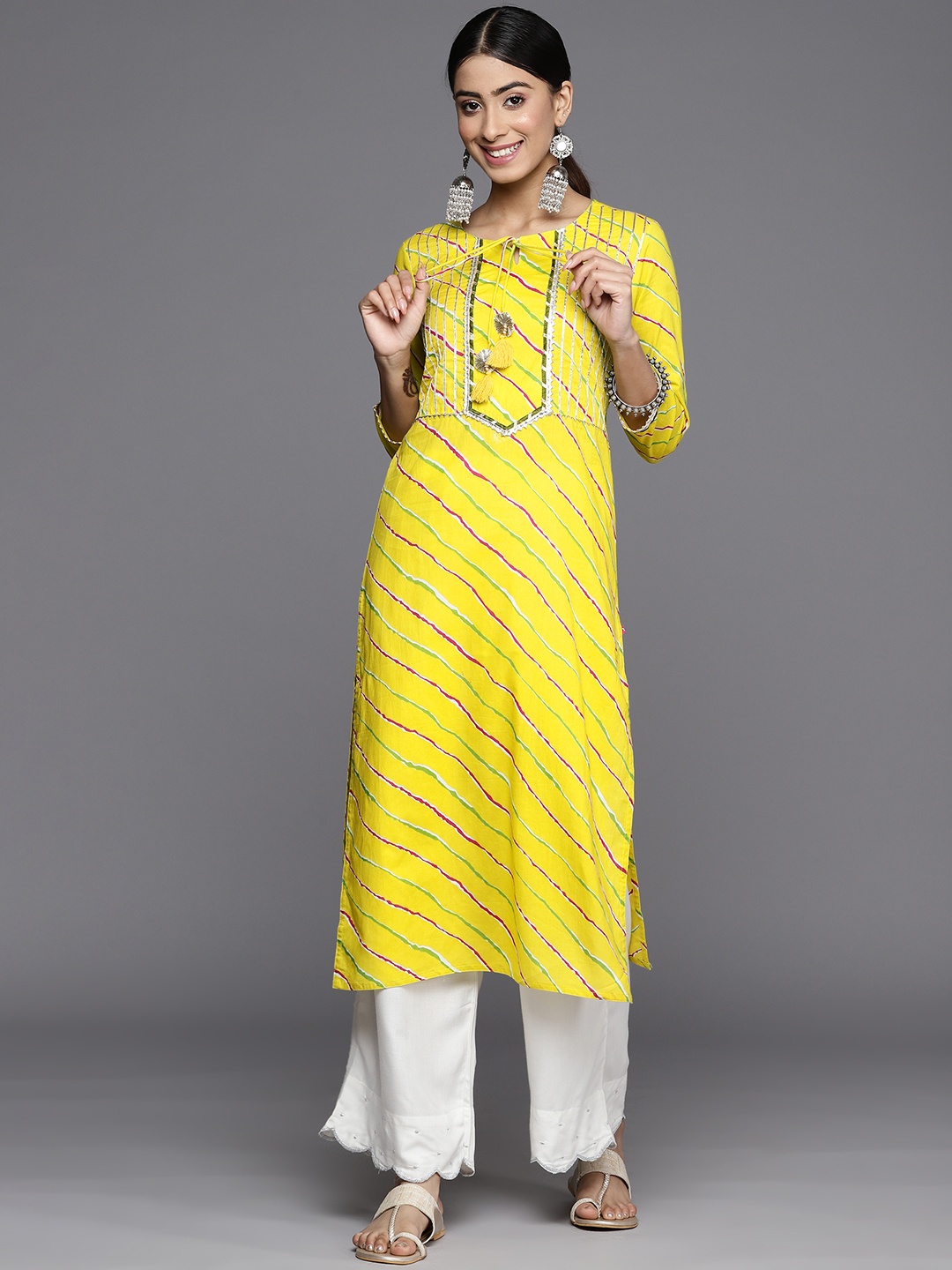

KSUT Leheriya Printed Gotta Patti Tie-Up Neck Cotton Straight Kurta, Yellow