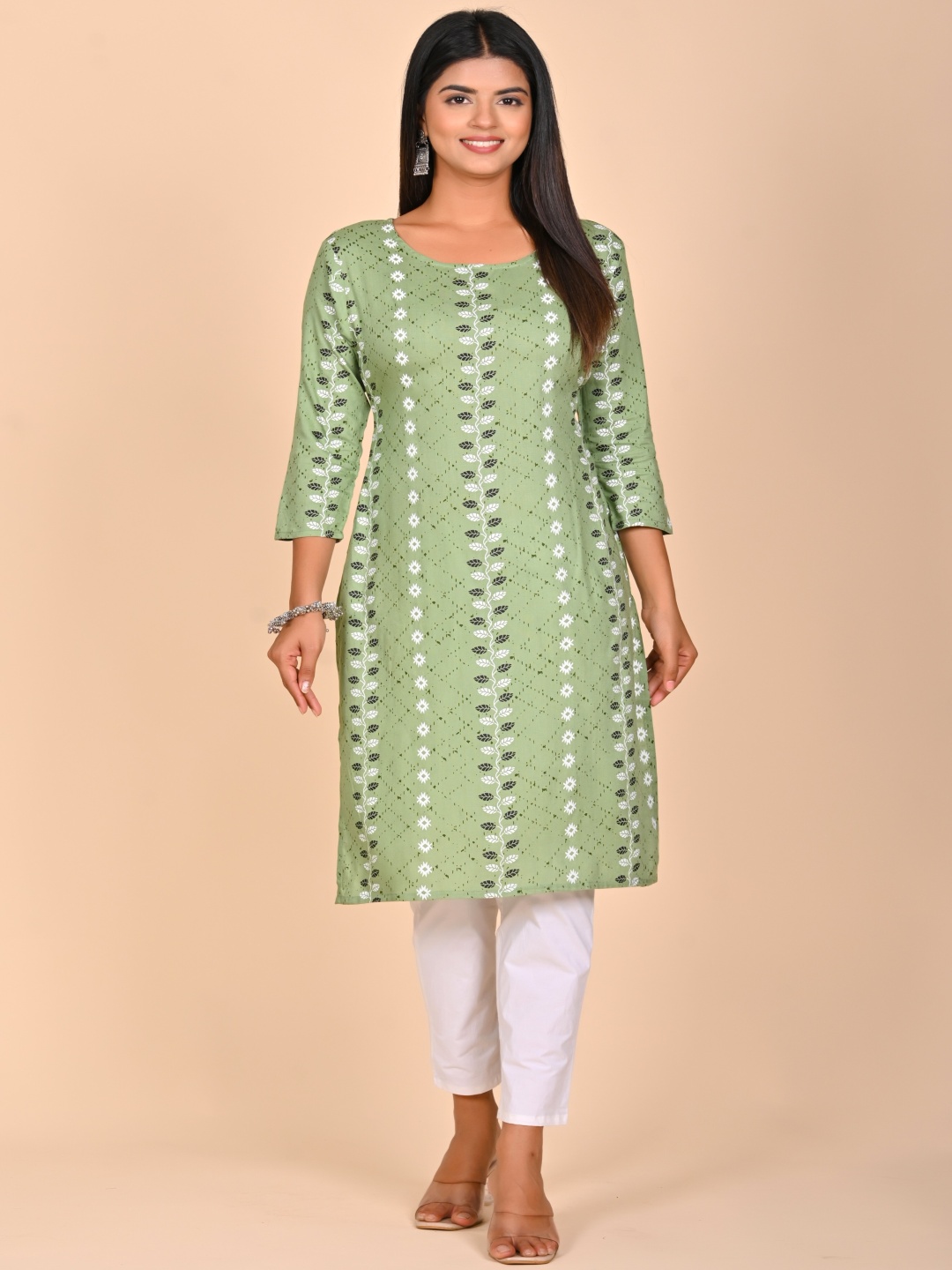 

Rashmi Shree Creation Women Floral Printed Regular Kurti with Palazzos, Green