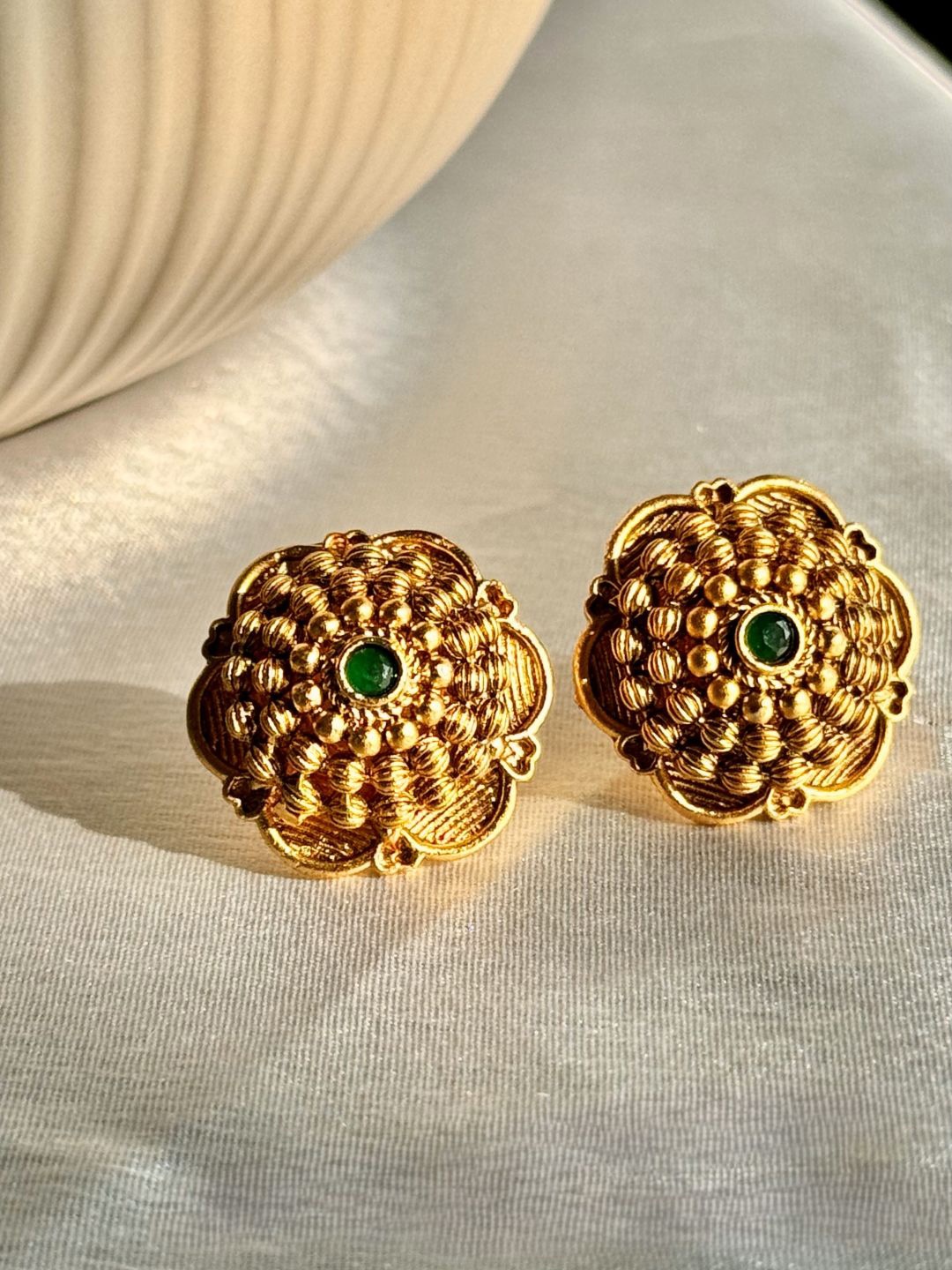 

The Jewellery Tale Gold-Plated Emerald Studded Floral Shaped Studs