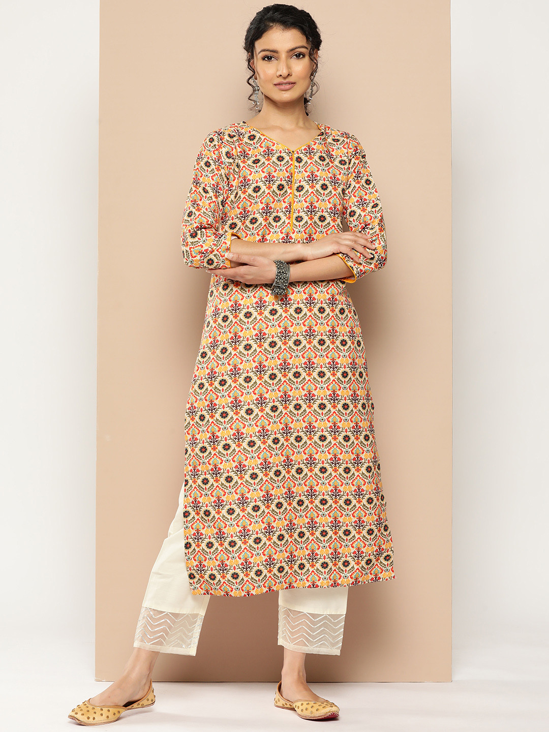 

KSUT Floral Printed V-Neck Straight Kurta, Yellow