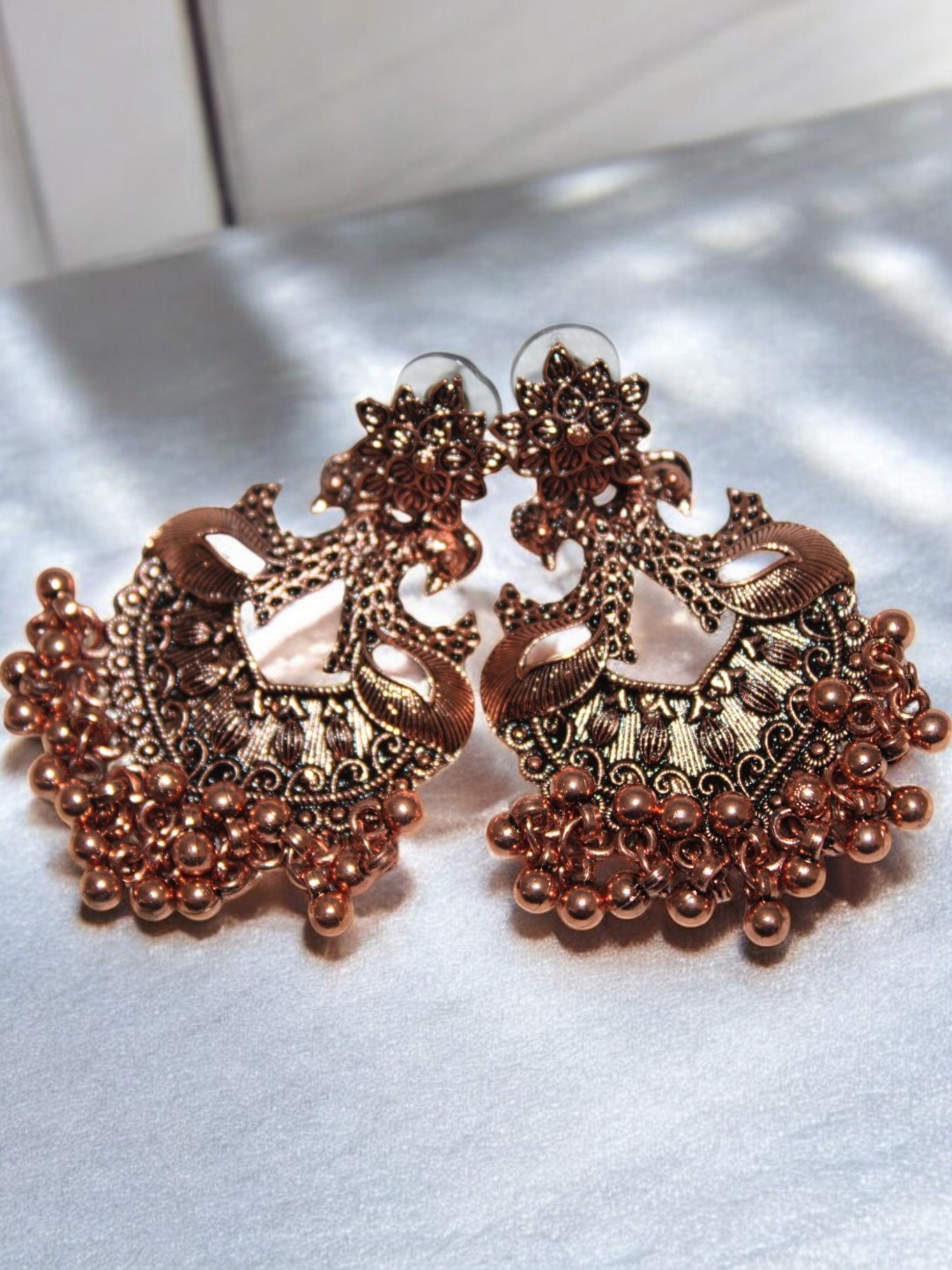 

Jolly Faces Artificial Beaded Copper Contemporary Shaped Drop Earrings