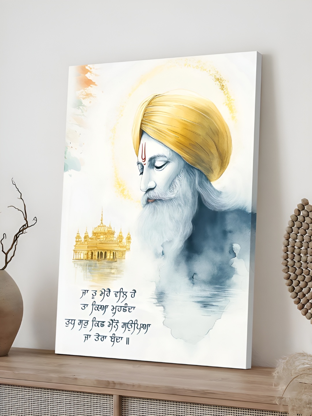 

Myntra Elegant Homes Yellow & Blue Guru Gobind Singh Ji Religious Canvas Wall Art