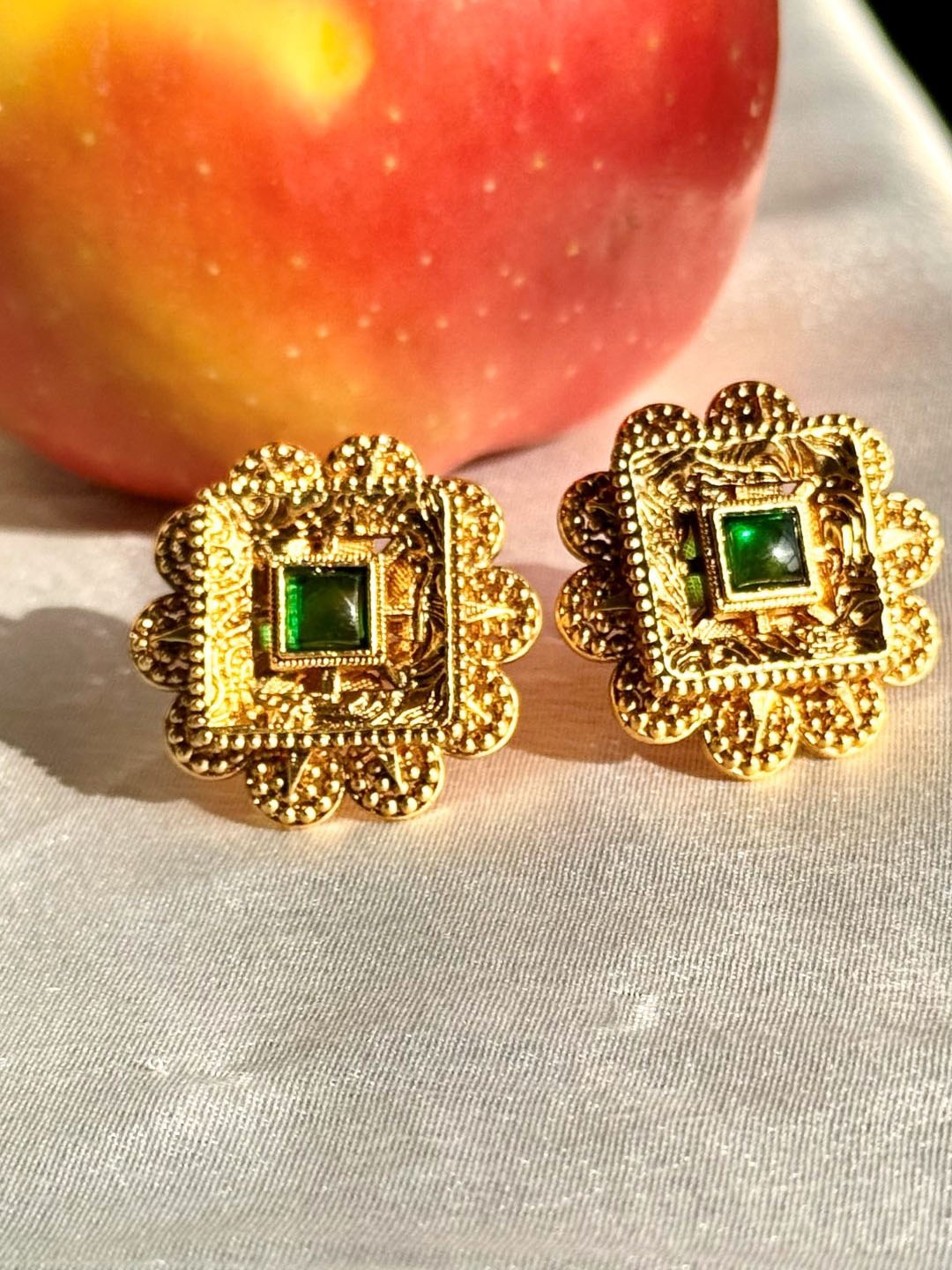 

The Jewellery Tale Gold-Plated Stones Studded Square Shaped Studs