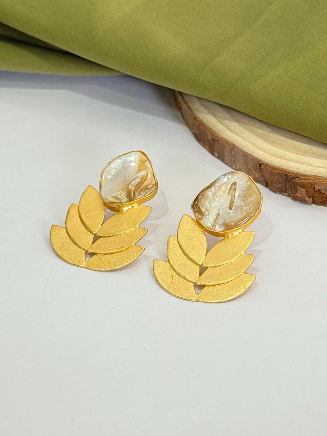 

The Jewellery Tale Gold-Plated Artificial Stones Studded Contemporary Drop Earrings