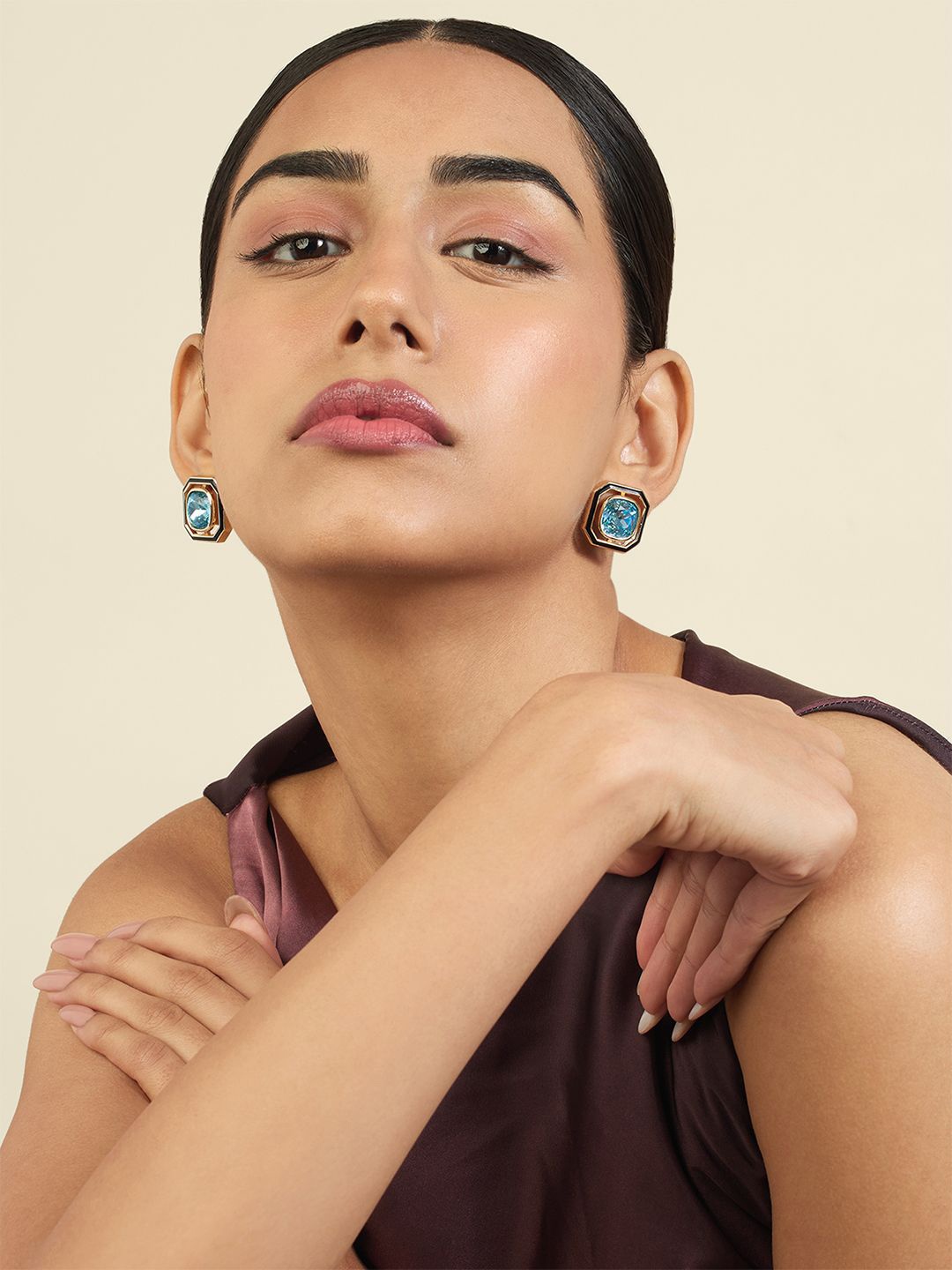 

Isharya 18Kt Gold Plated Contemporary Crystals Studded Studs