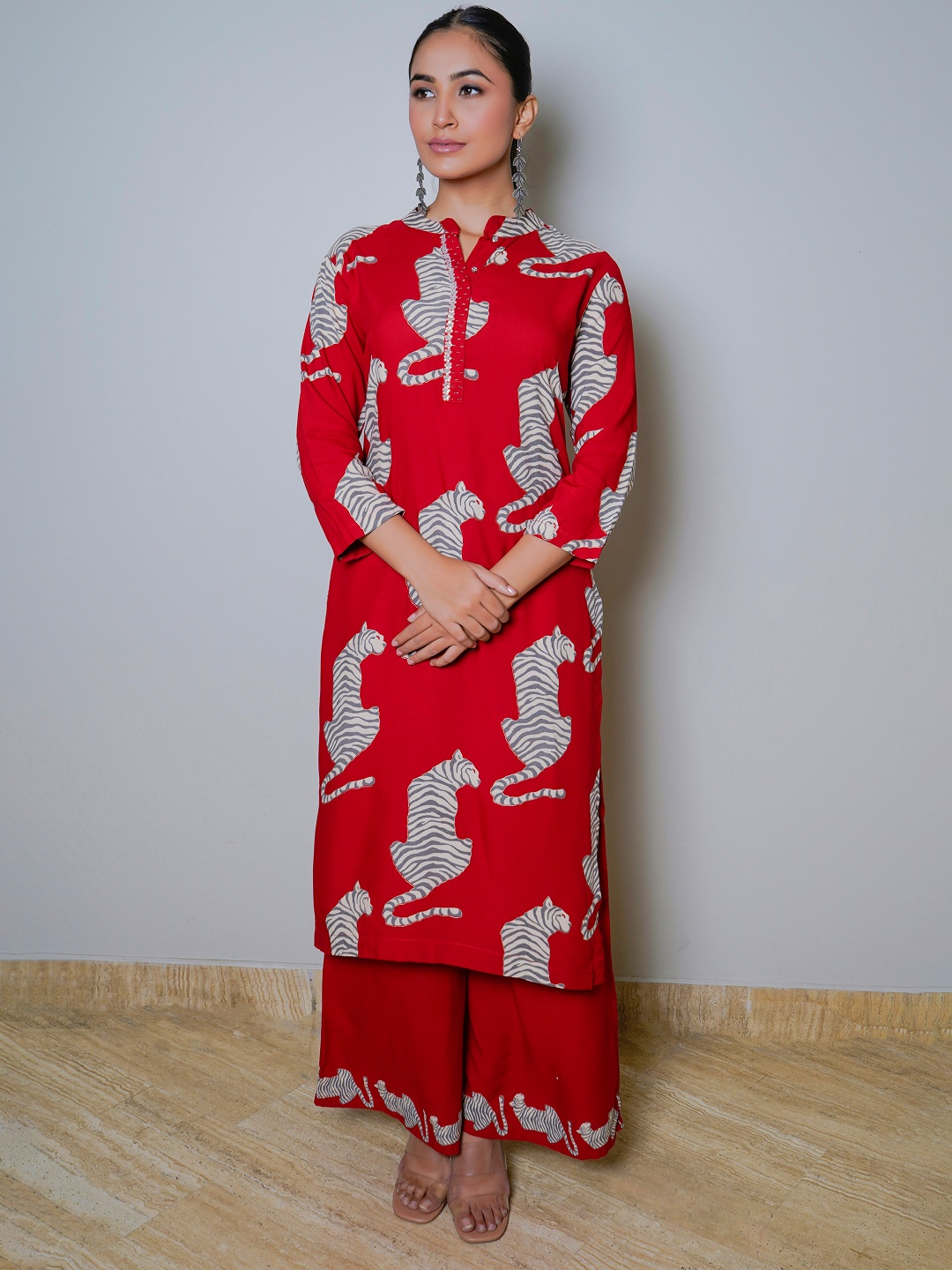 

Sindh Fashion Women Animal Printed Regular Kurta with Palazzos, Red