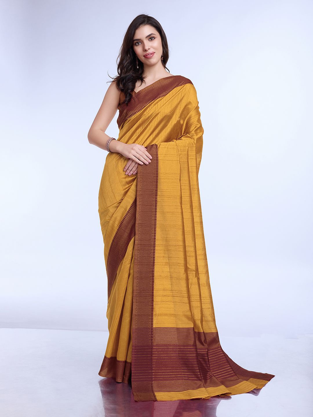 

DIVASTRI Silk Blend Saree, Mustard