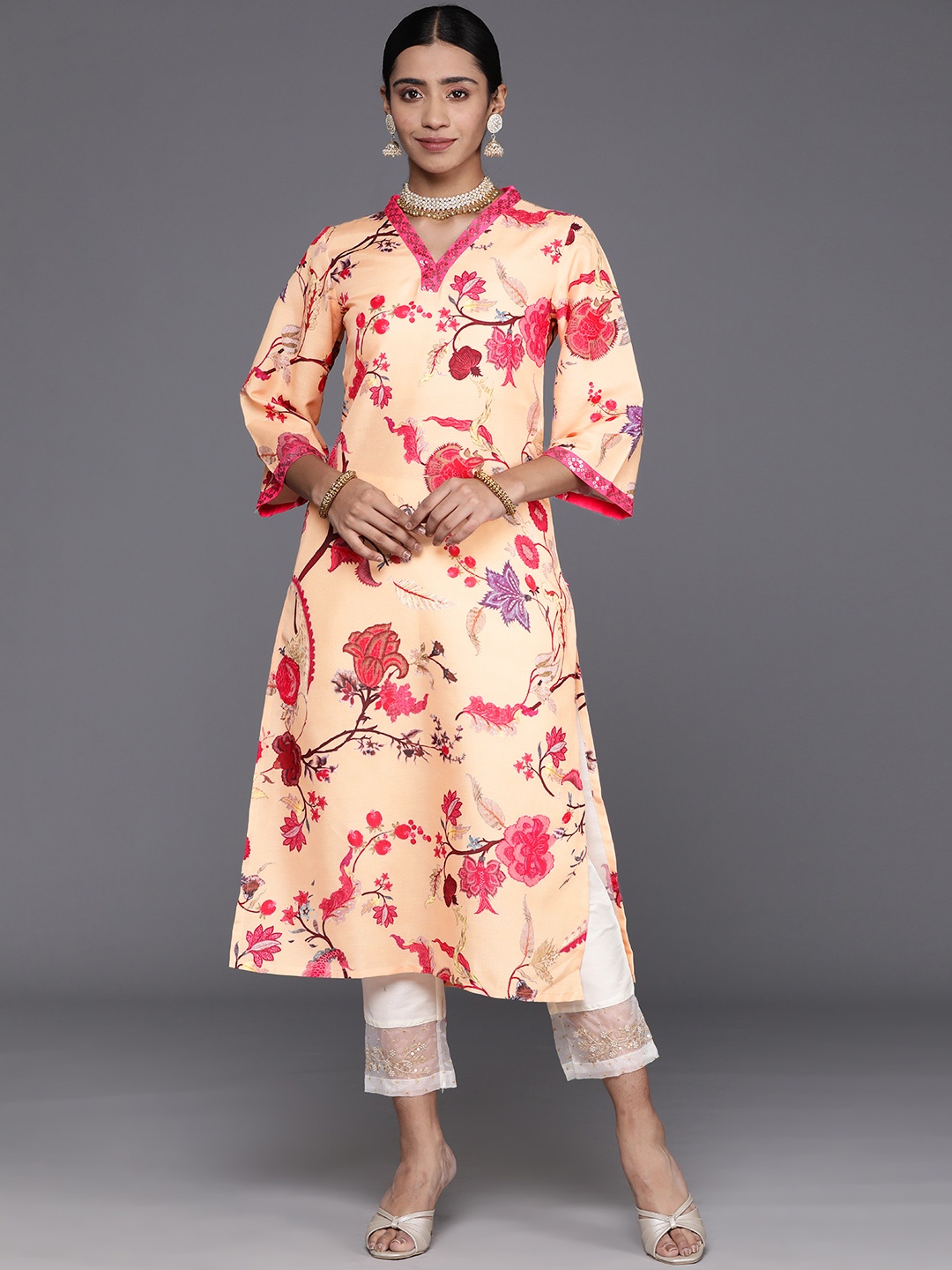 

KSUT Floral Printed Flared Sleeves Sequinned Straight Kurta, Mustard