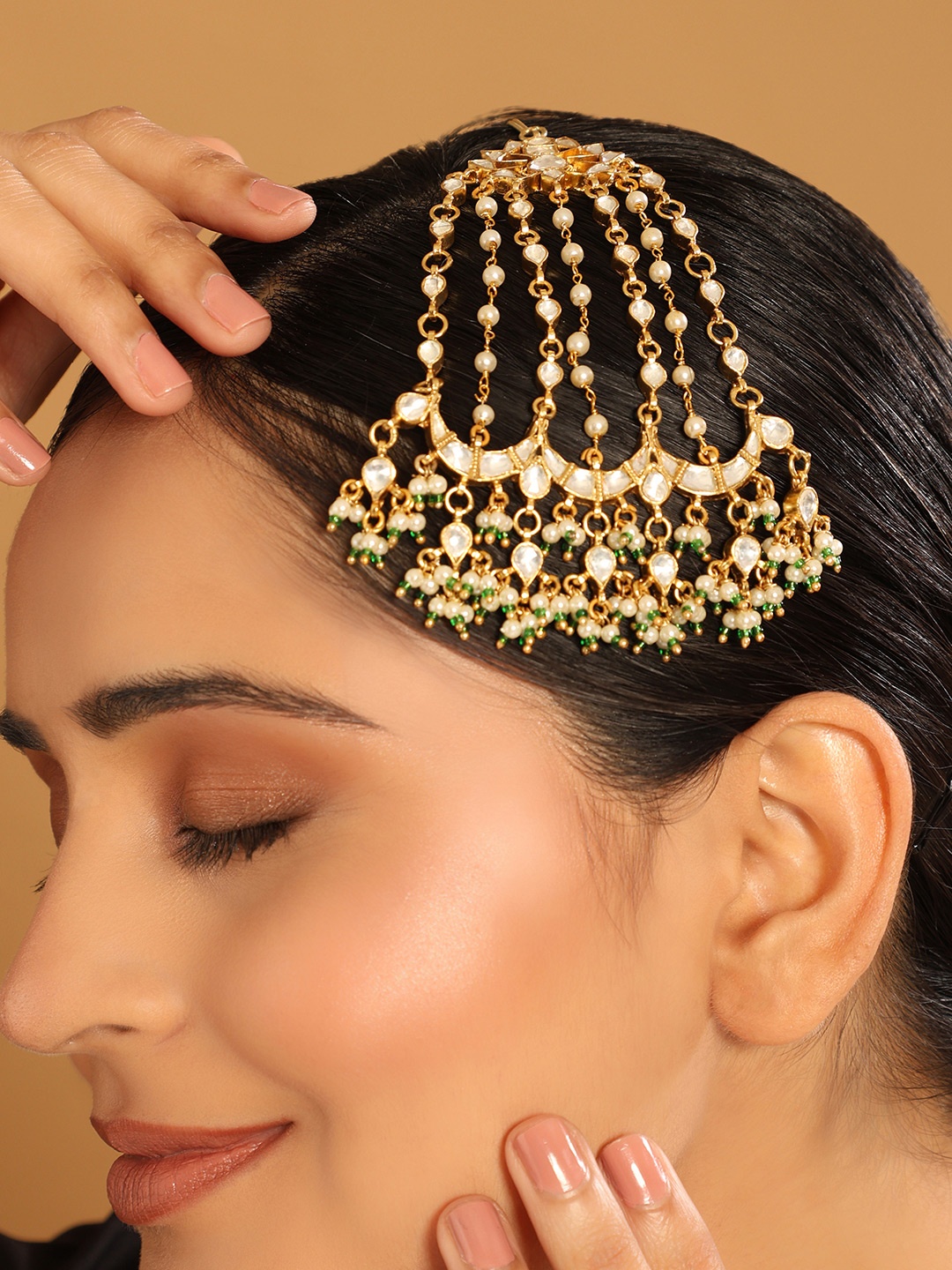 

Yinara Gold-Plated Kundan Studded Jhumar Passa Head Jewellery