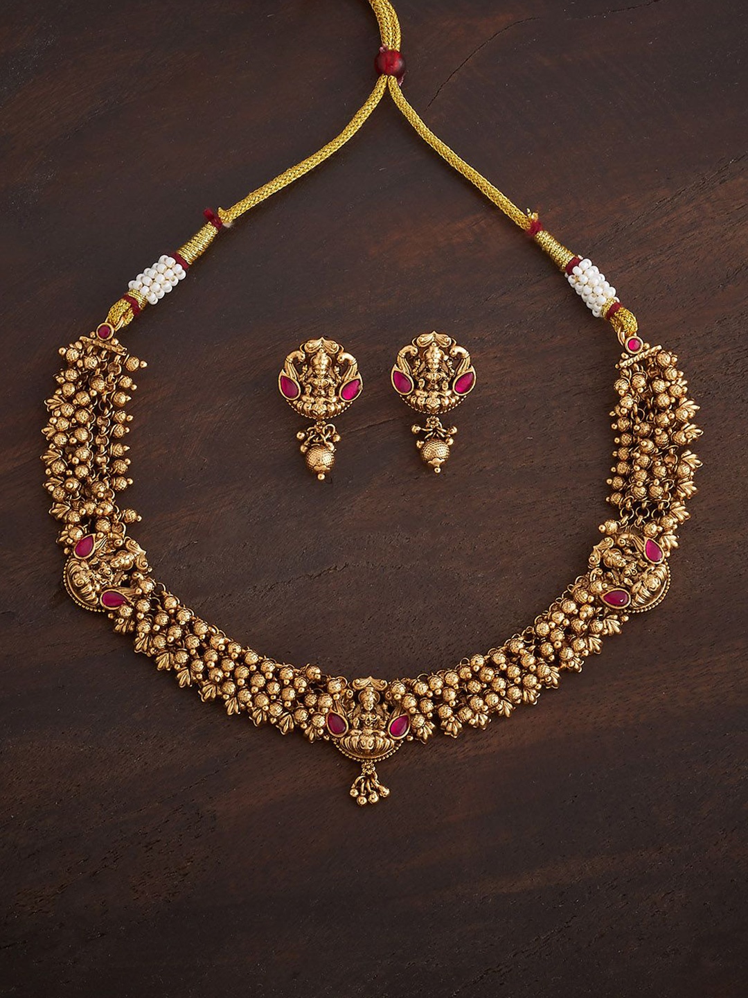 

Kushal's Fashion Jewellery Ruby Gold-Plated Ethnic Antique Jewellery Set