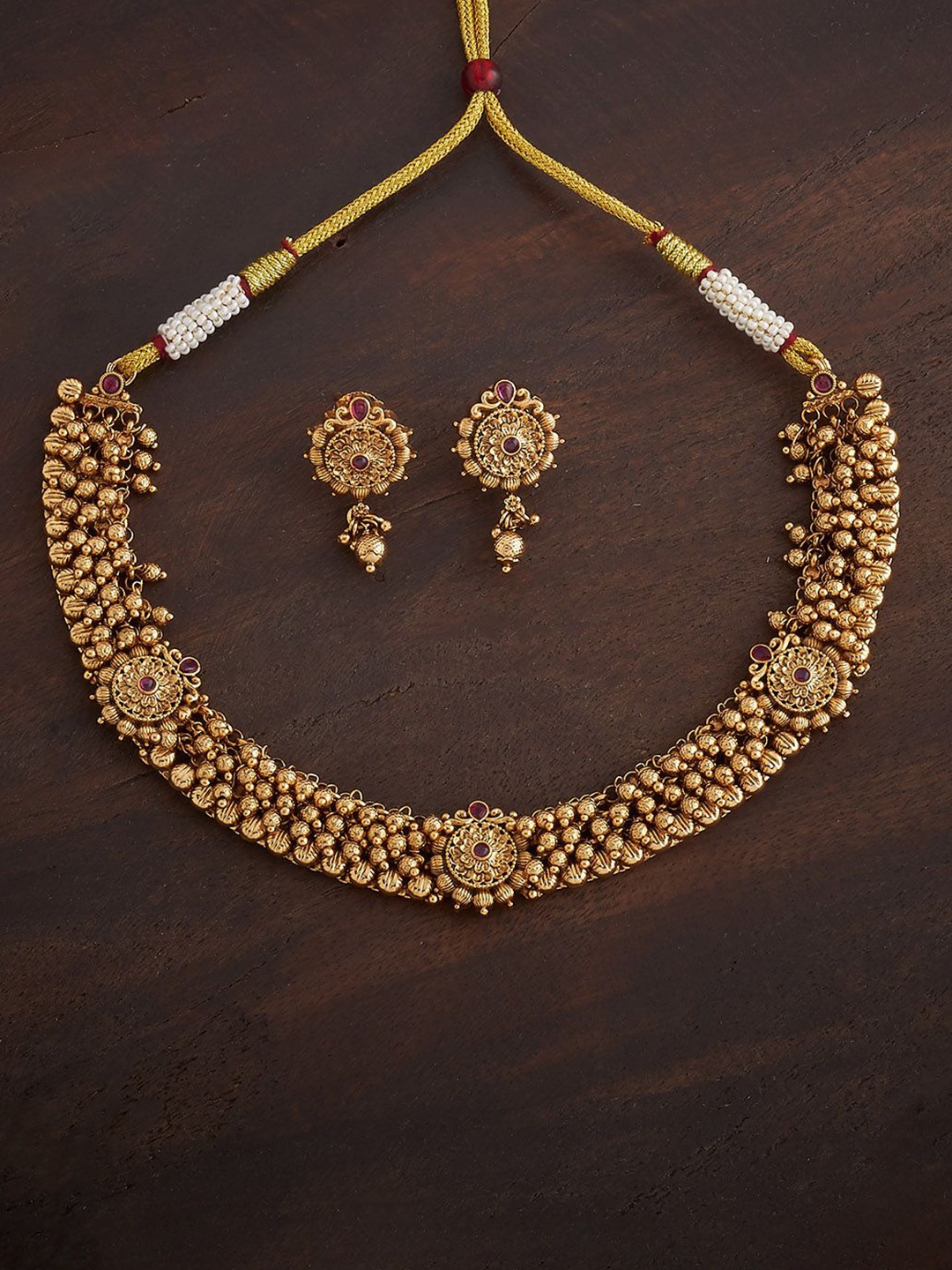 

Kushal's Fashion Jewellery Ruby Gold-Plated Ethnic Antique Jewellery Set