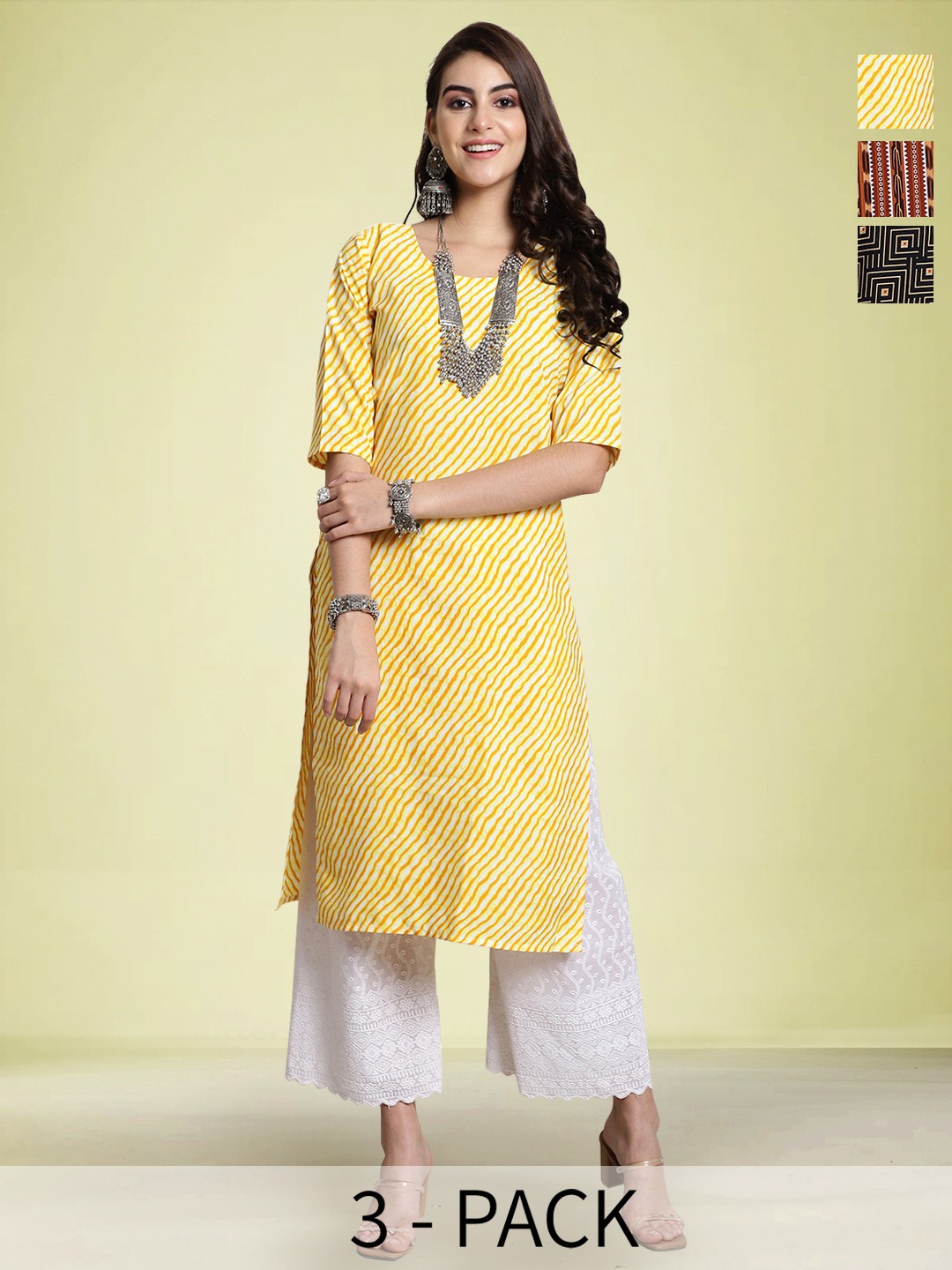 

Moda Rapido Selection Of 3 Leheriya Printed Round Neck Straight Kurtas, Yellow