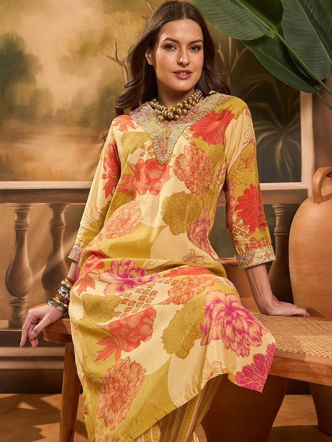 

Sangria Floral Printed V Neck Straight Kurta & Trousers, Mustard