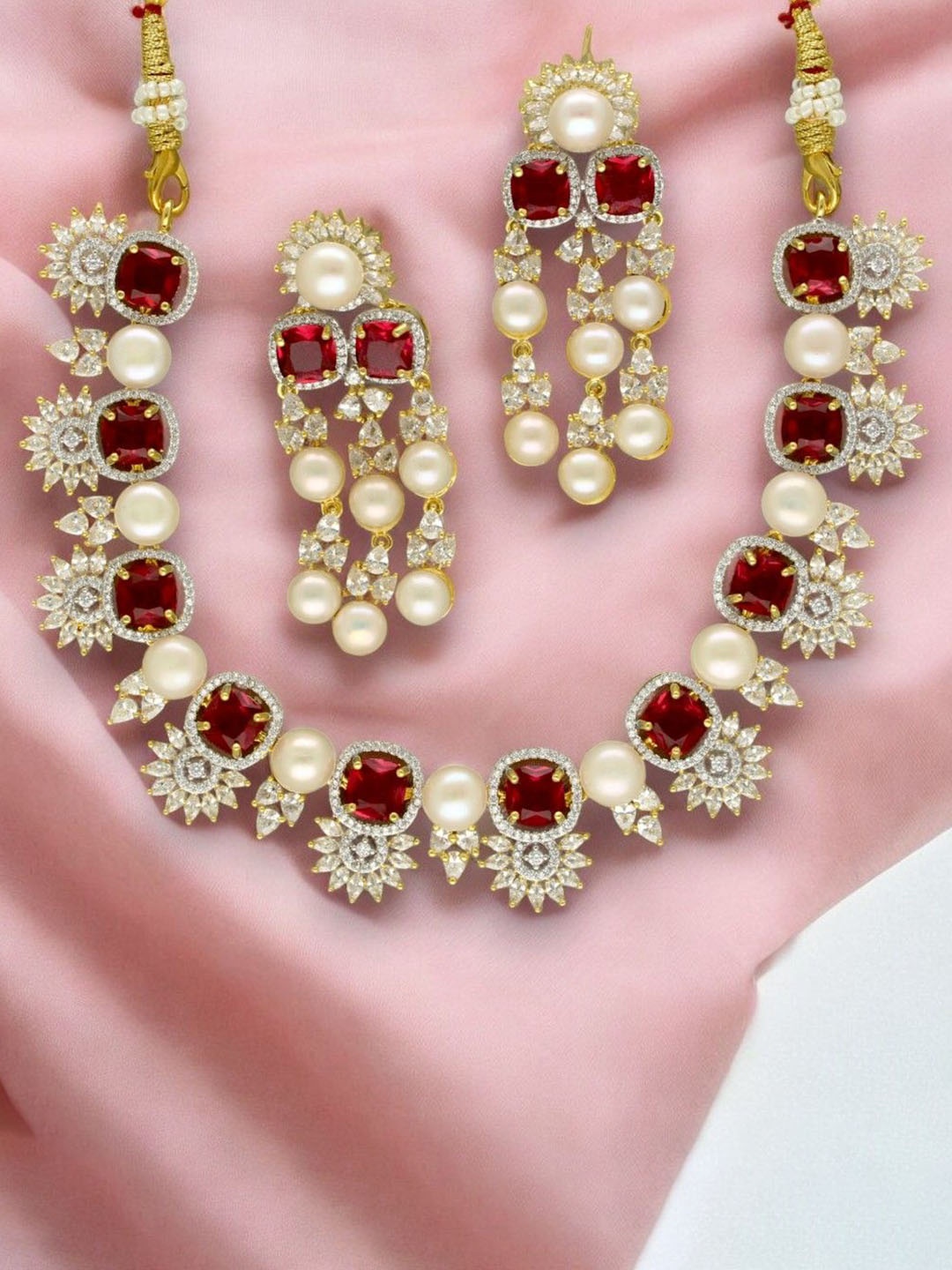 

Sri Jagdamba Pearls Dealer Gold-Plated Pearls Studded Jewellery Set