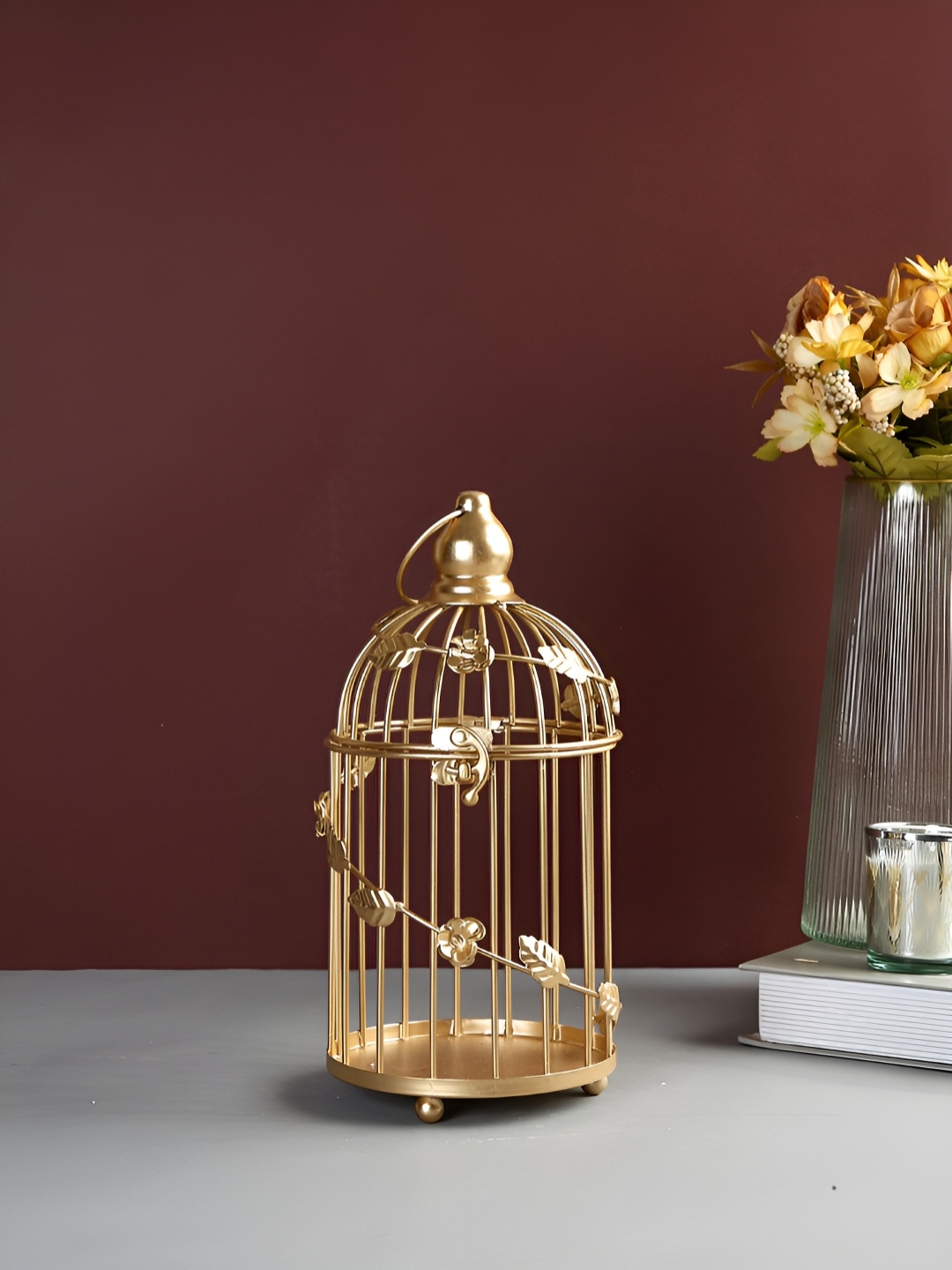 

Myntra Elegant Homes Gold-Toned Candle Holder