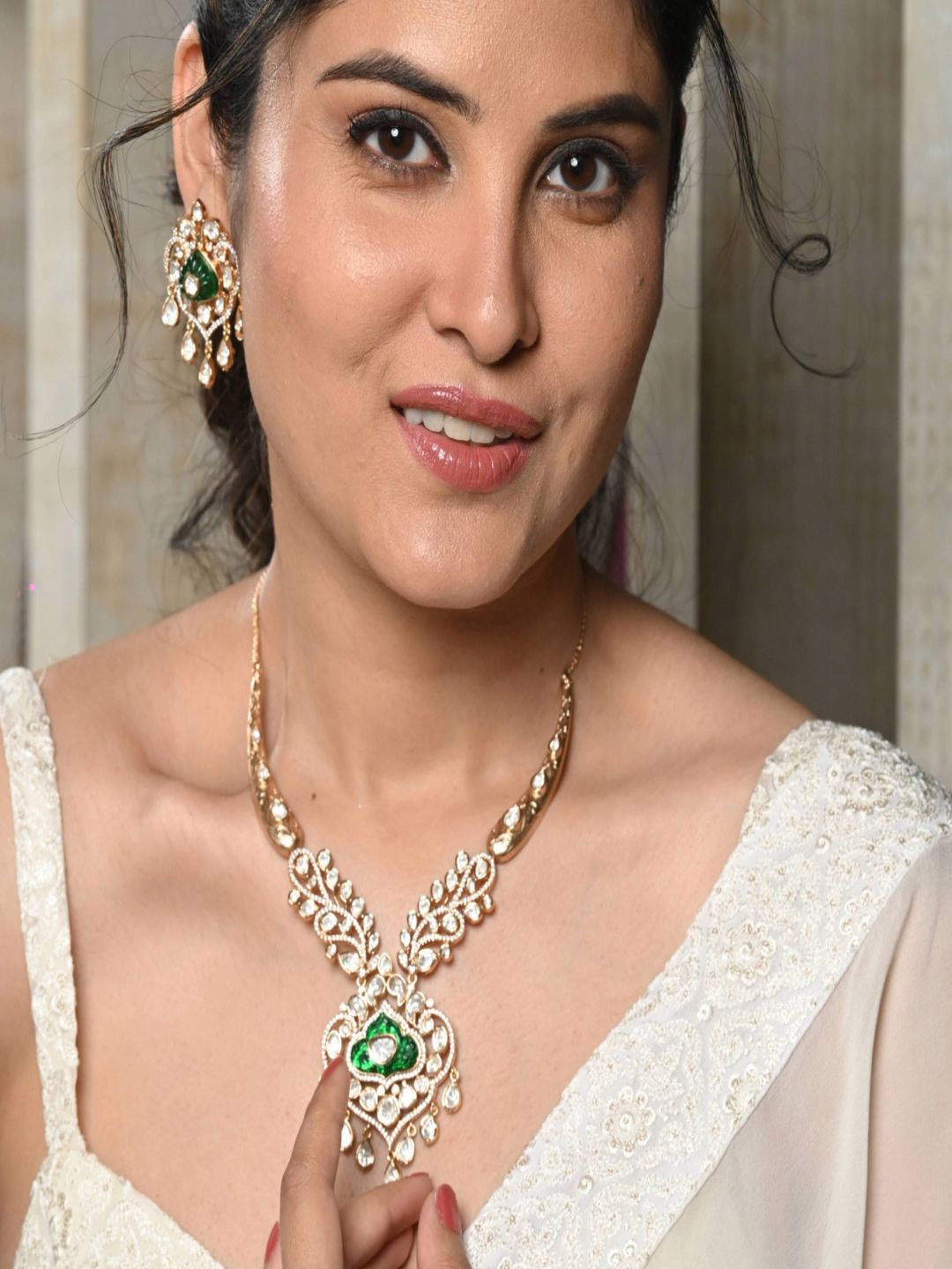 

Stridhan Gold-Plated Elegant Emerald Kundan Studded Floral Necklace Set