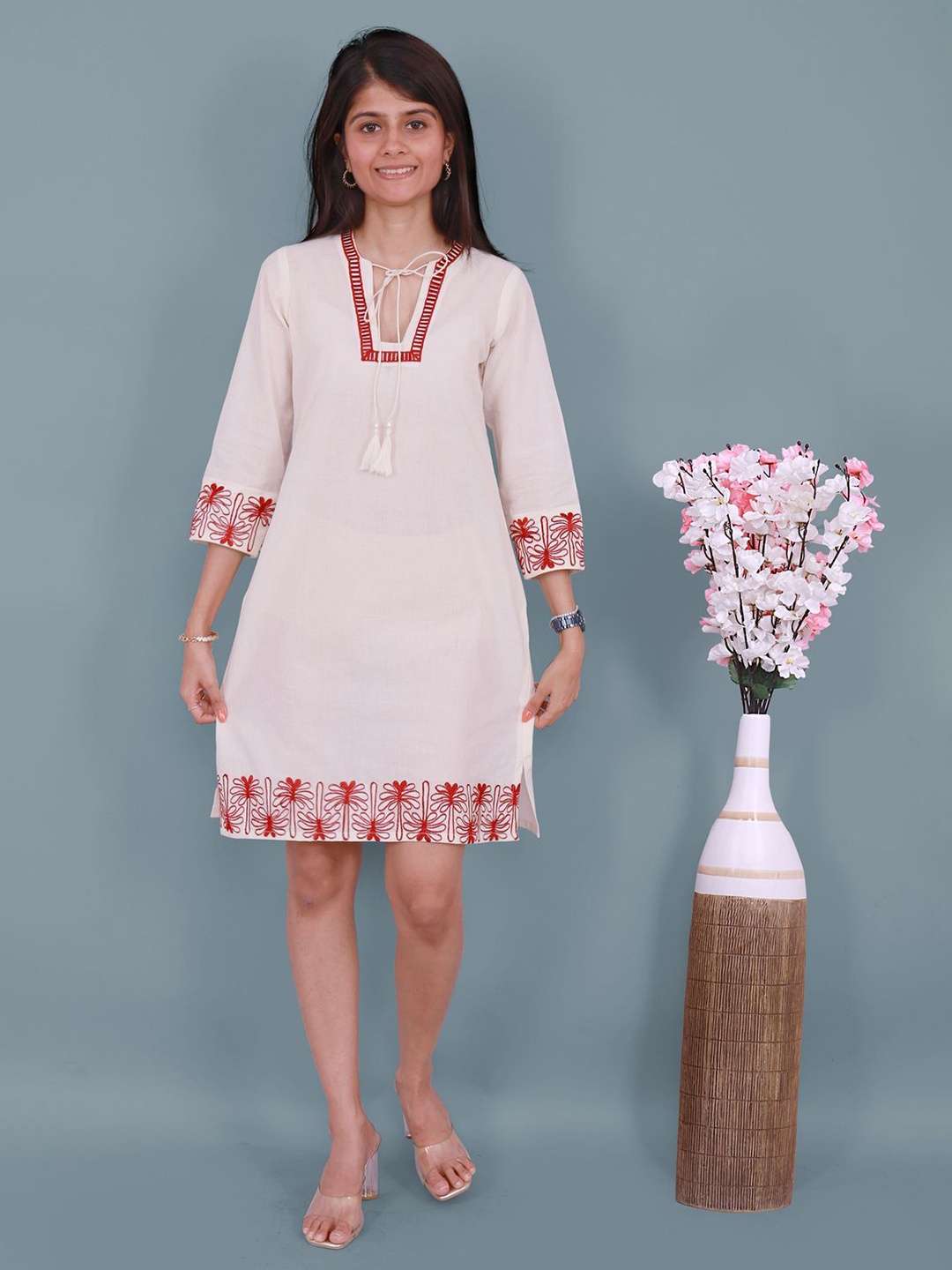 

Kaajal by Vidhi Ethnic Motifs Embroidered Tie-Up Neck A-Line Dress, Off white