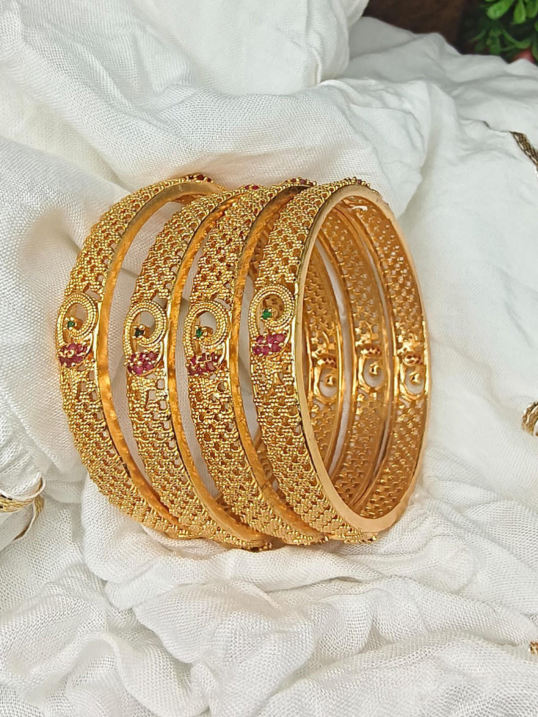 

House of Pataudi Set Of 4 Gold Plated American Diamond-Studded Bangles