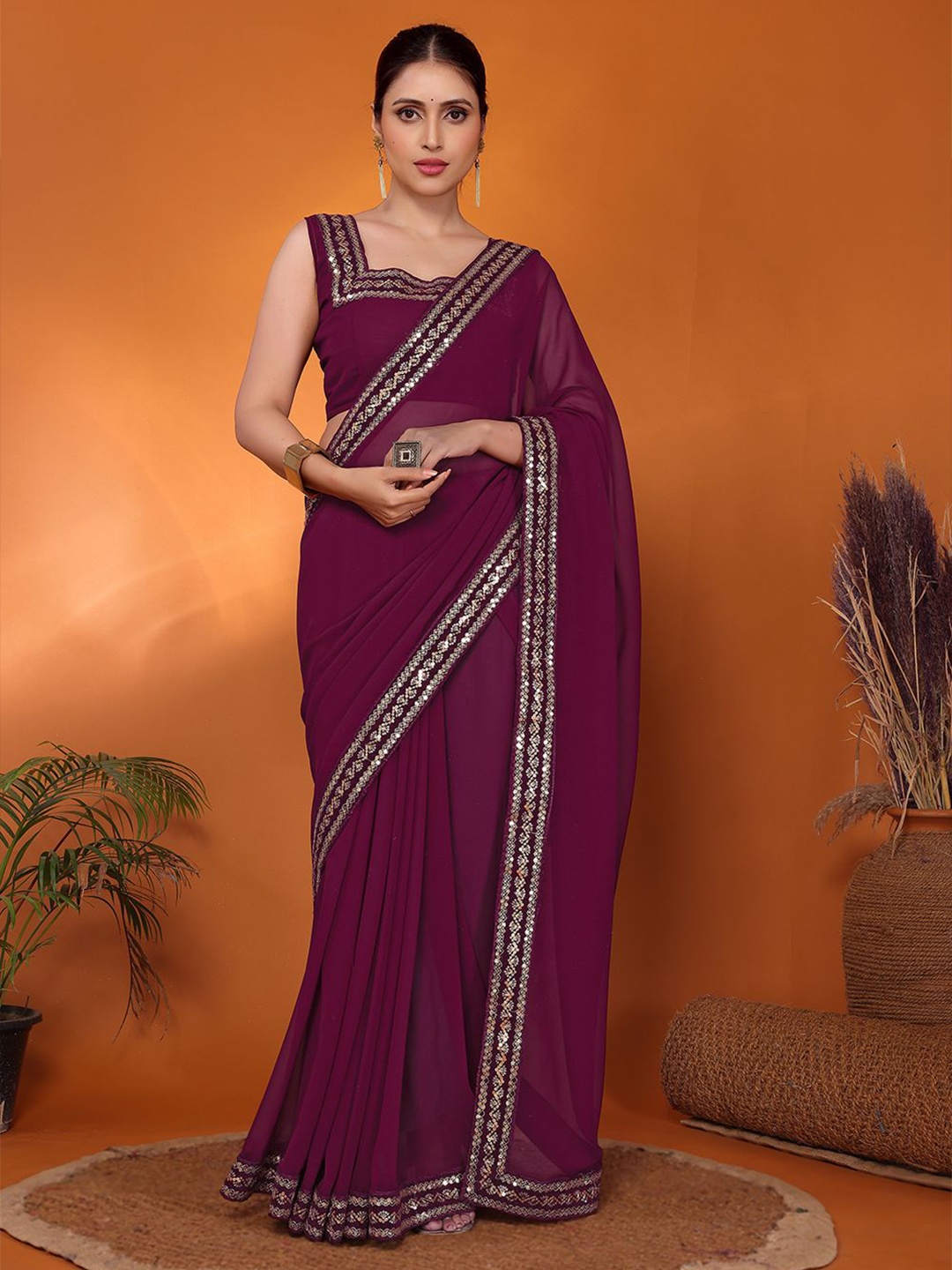 

FABMORA Embellished Sequinned Pure Georgette Saree, Purple