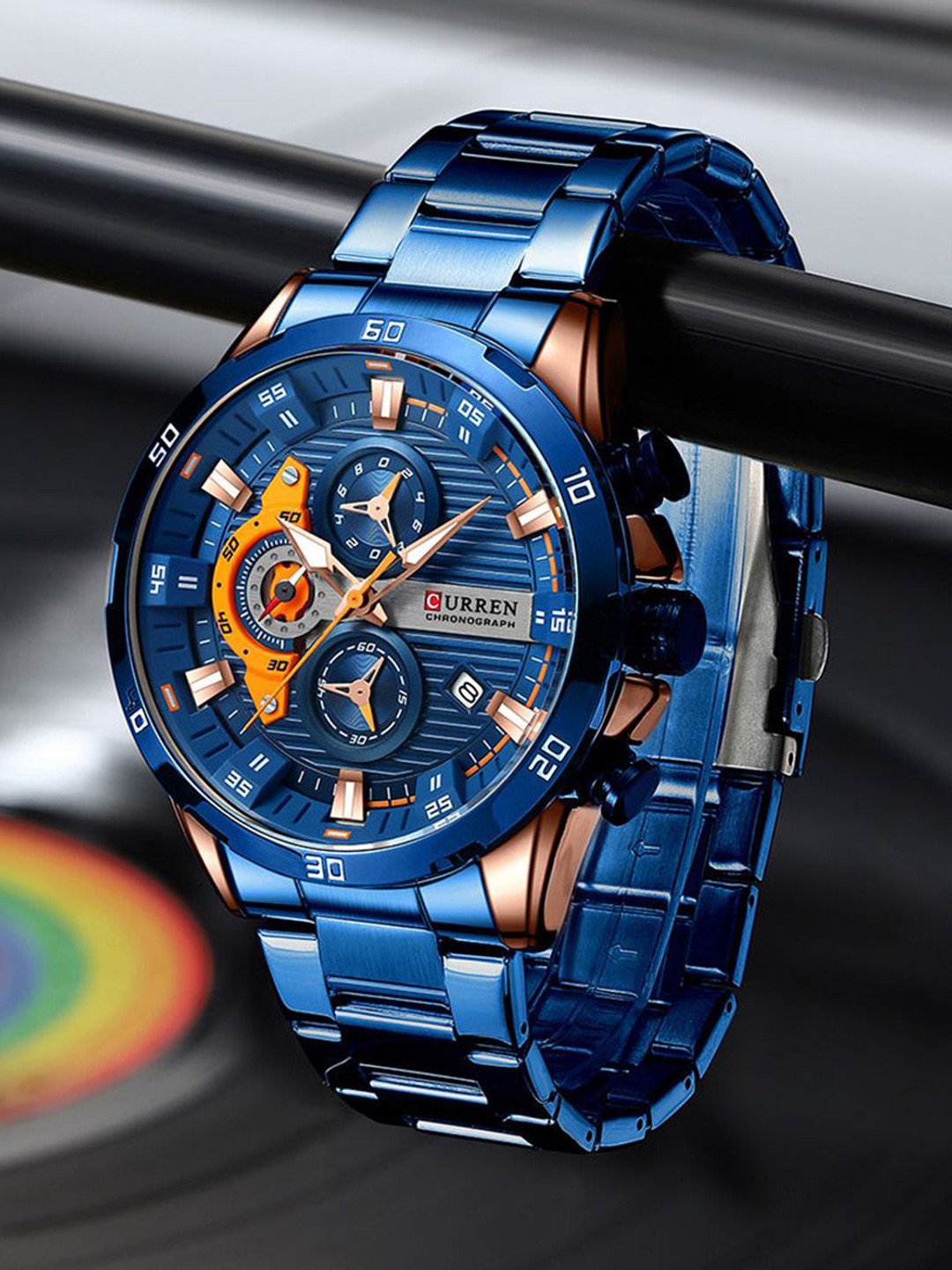 

Curren Men Brass Embellished Dial & S S Bracelet Style Straps Analogue Watch, Blue
