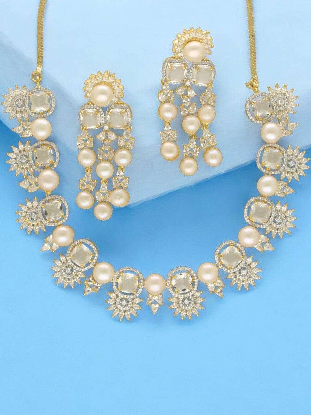 

Sri Jagdamba Pearls Gold-Plated Stone Studded & Beaded Jewellery Set