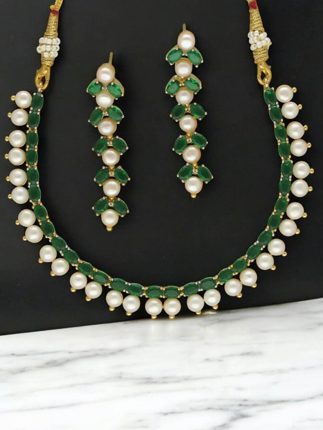 

Sri Jagdamba Pearls Dealer Gold-Plated Pearls Studded Jewellery Set