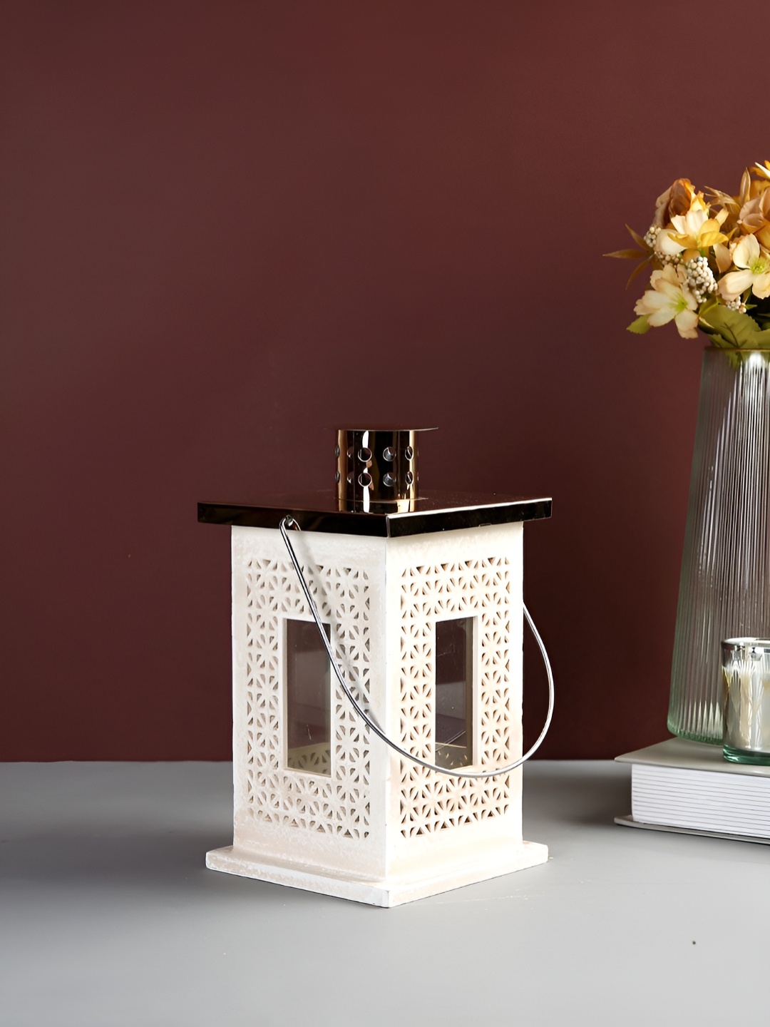 

Myntra Elegant Homes Cream-Coloured Candle Holder