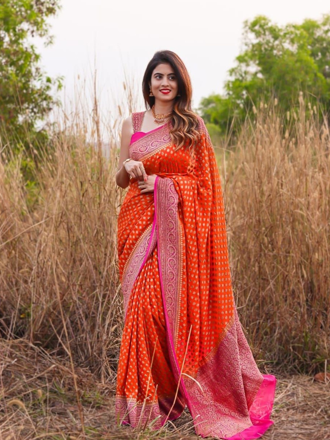 

Rangtulika Ethnics Woven Design Zari Silk Cotton Saree, Orange