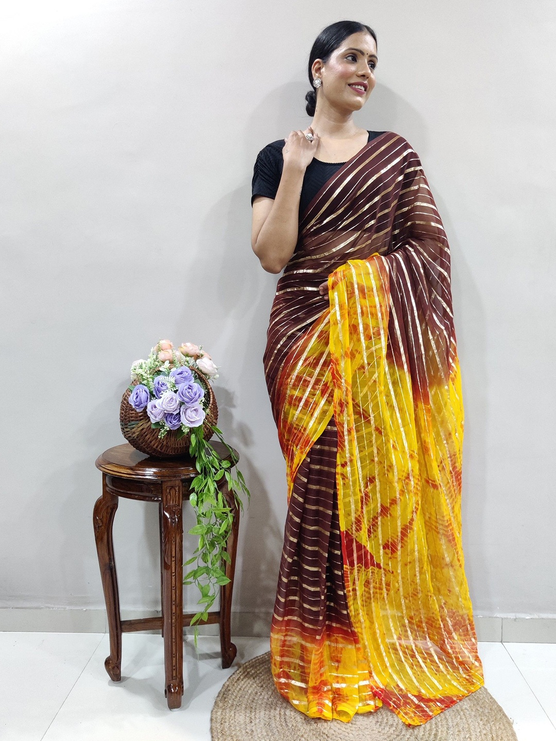 

Rangtulika Ethnics Striped Organza Designer Saree, Brown