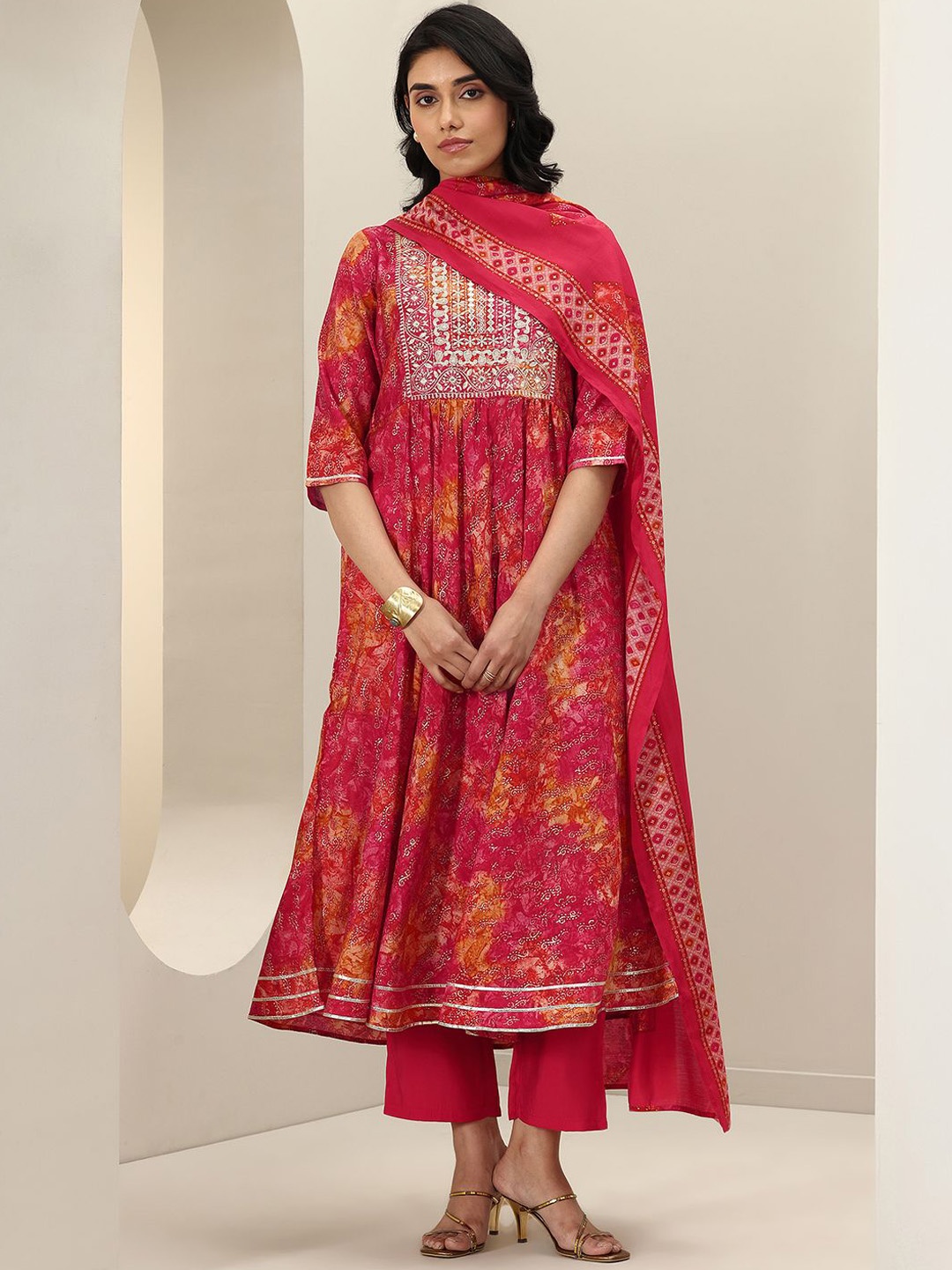 

Libas Women Ethnic Motifs Printed Pleated Gotta Patti Kurta with Trousers & With Dupatta, Orange