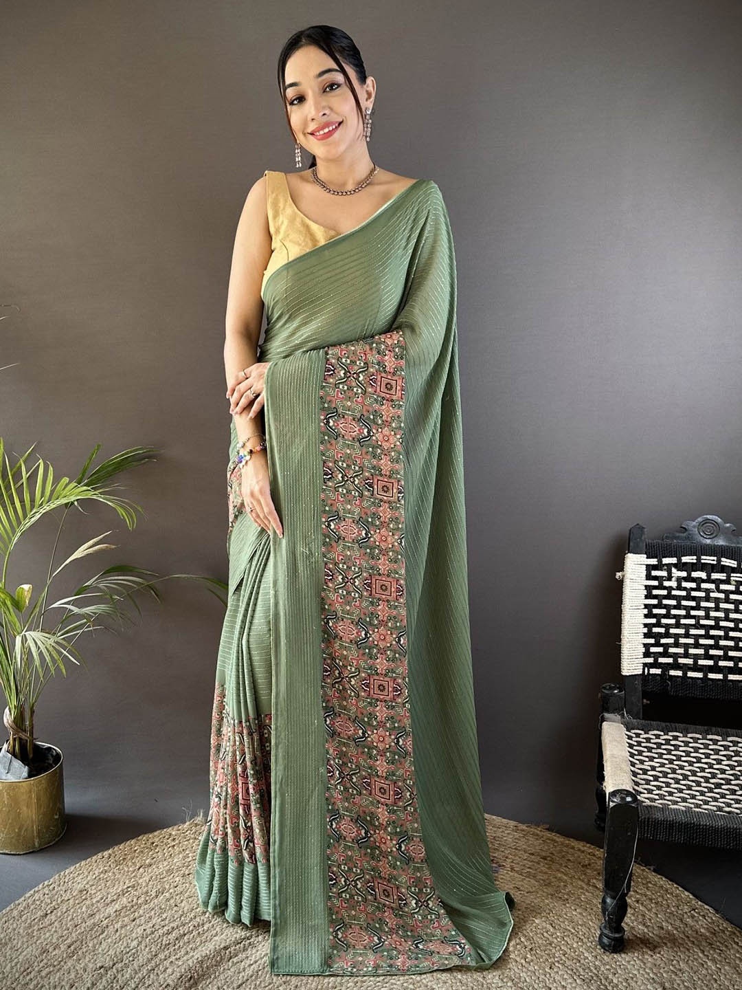 

Mitera Embellished Sequinned Poly Georgette Saree, Green