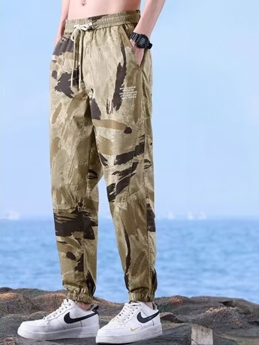 

HERE&NOW Men Printed Joggers, Brown