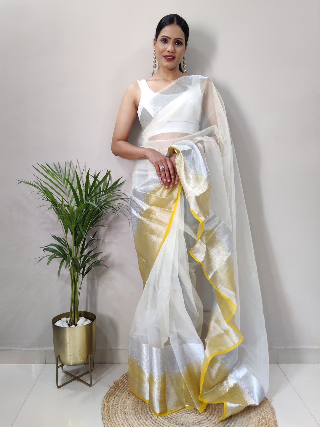 

Rangtulika Ethnics Woven Design Zari Organza Saree, Yellow