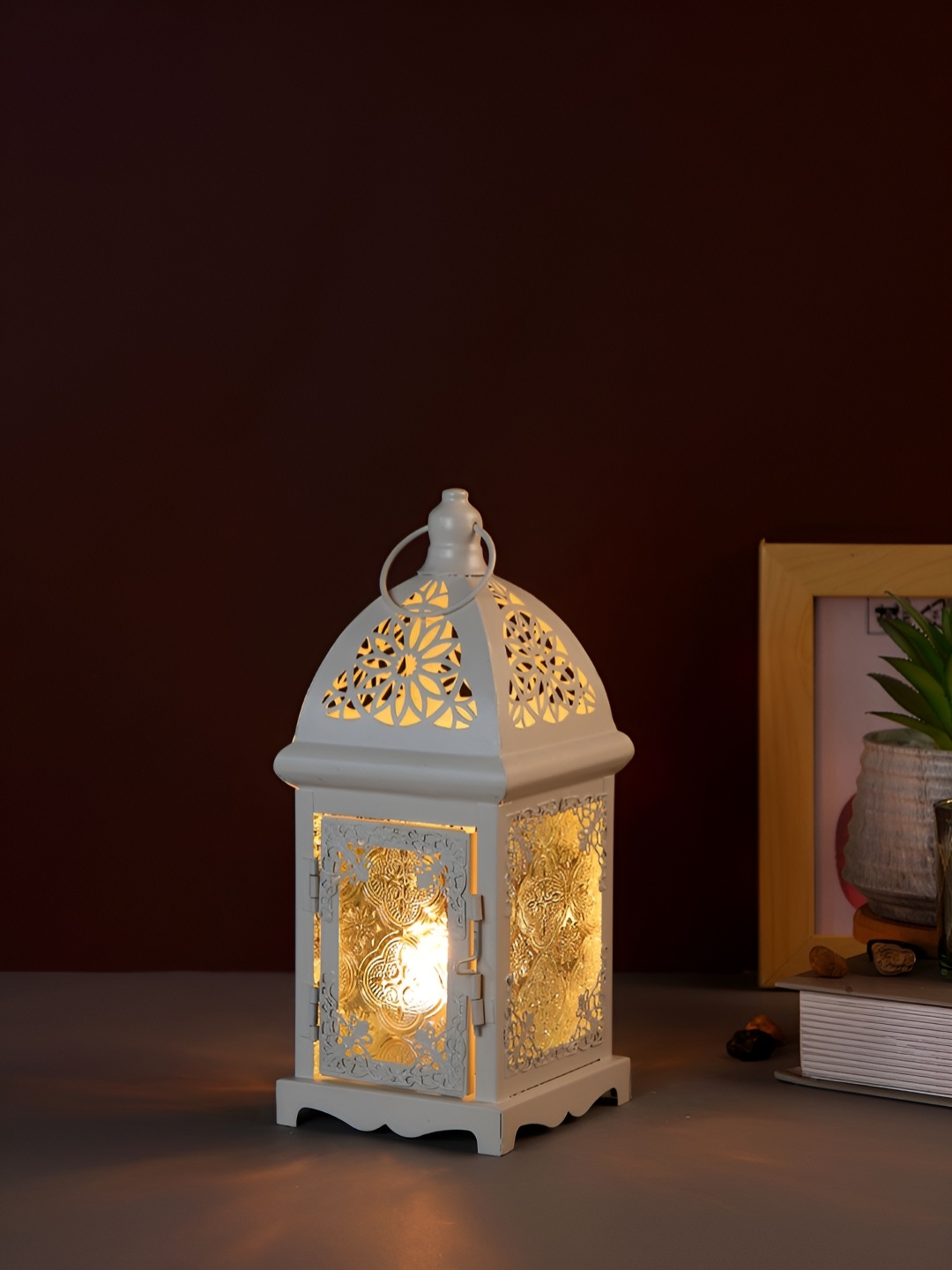 

Myntra Elegant Homes White Candle Holder