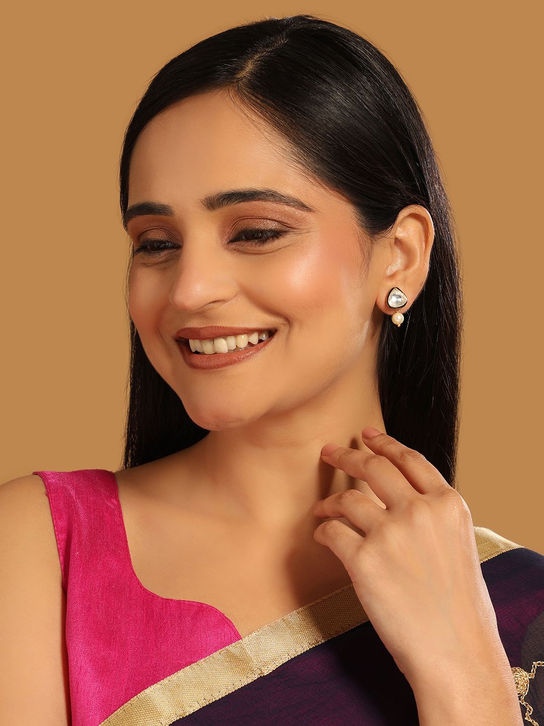 

Yinara 22K Gold Plated Kundan Studded Contemporary Studs