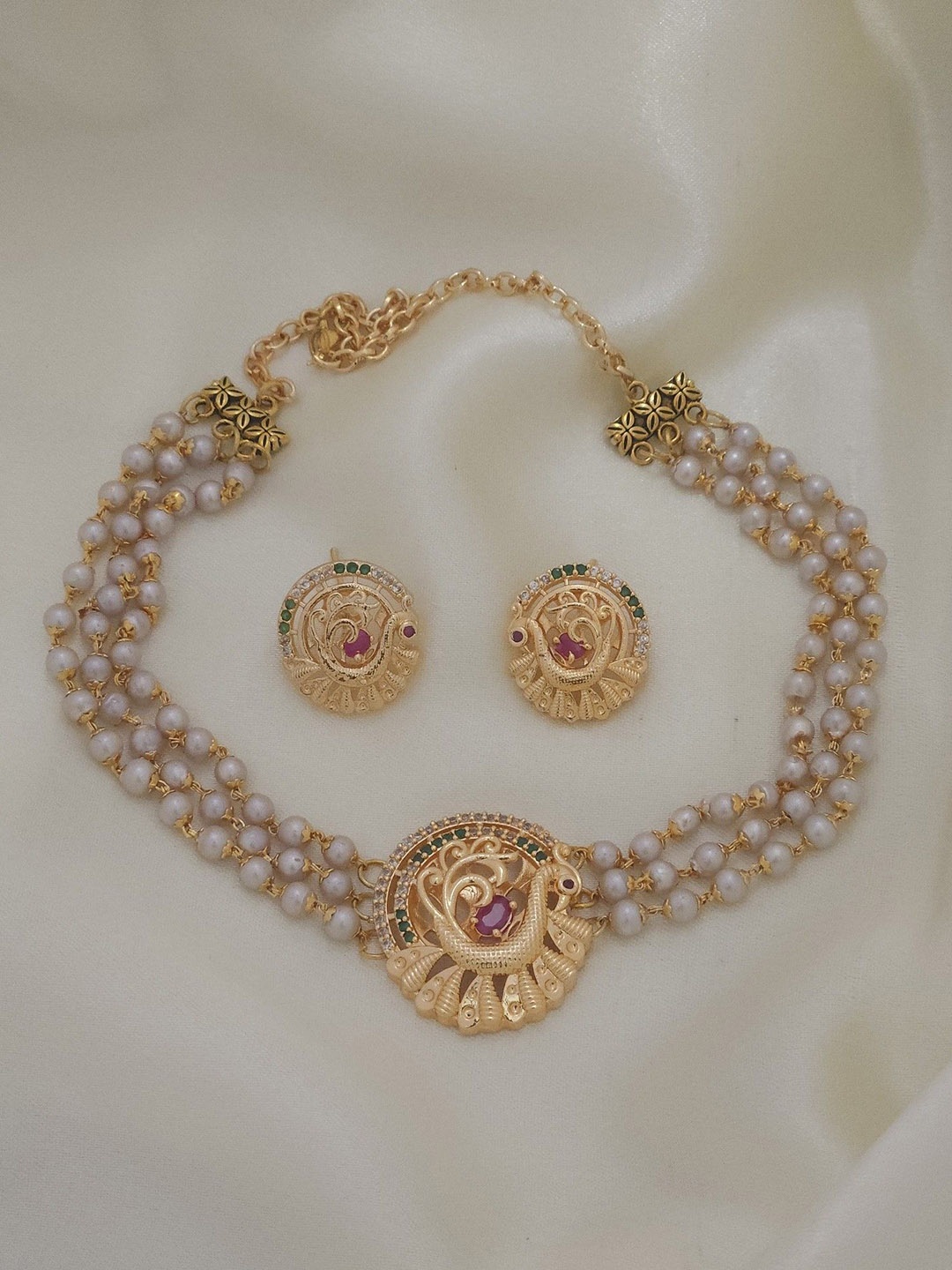 

Rujve Jewellery Gold-Plated Artificial Stone Studded & Beaded Jewellery Set