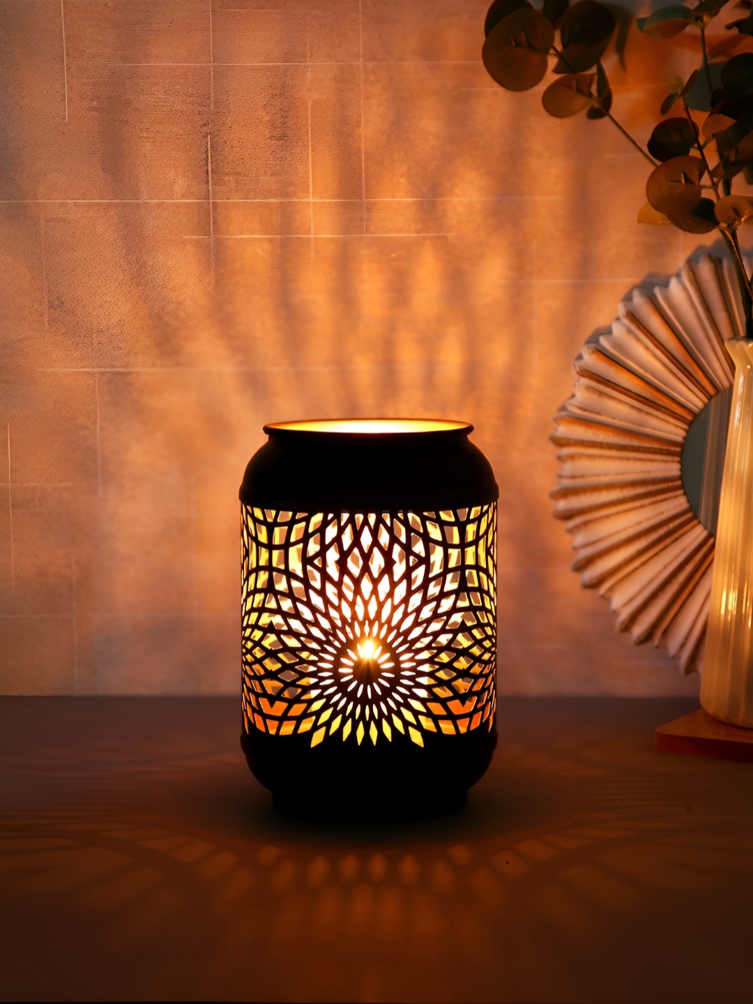 

Myntra Elegant Homes Black Candle Holder