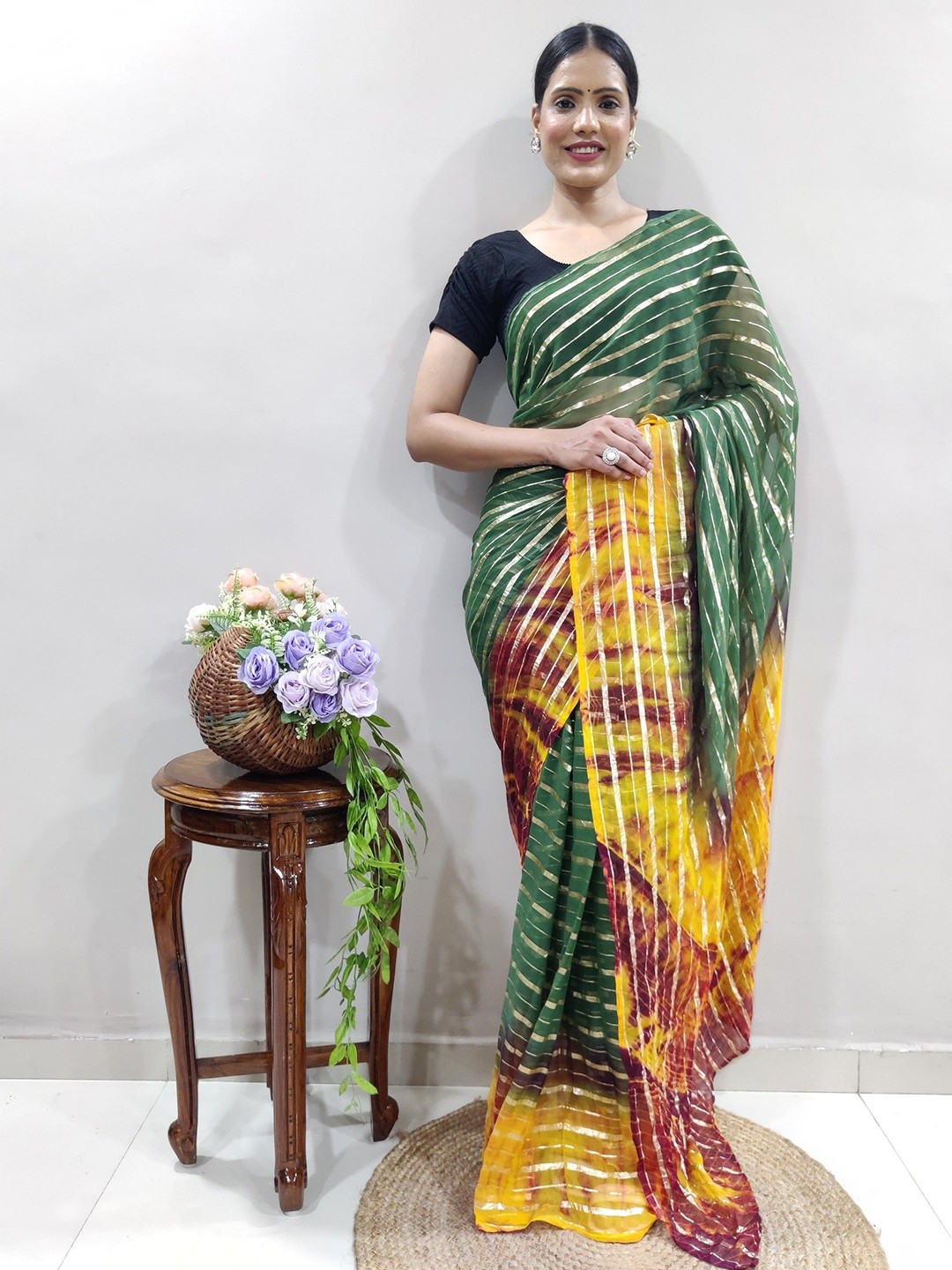 

Rangtulika Ethnics Striped Organza Saree, Green