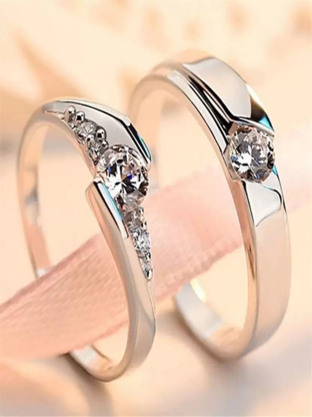 

Teeragaj Set Of 2 Silver-Plated Cubic Zirconia Stone Studded Adjustable Finger Ring