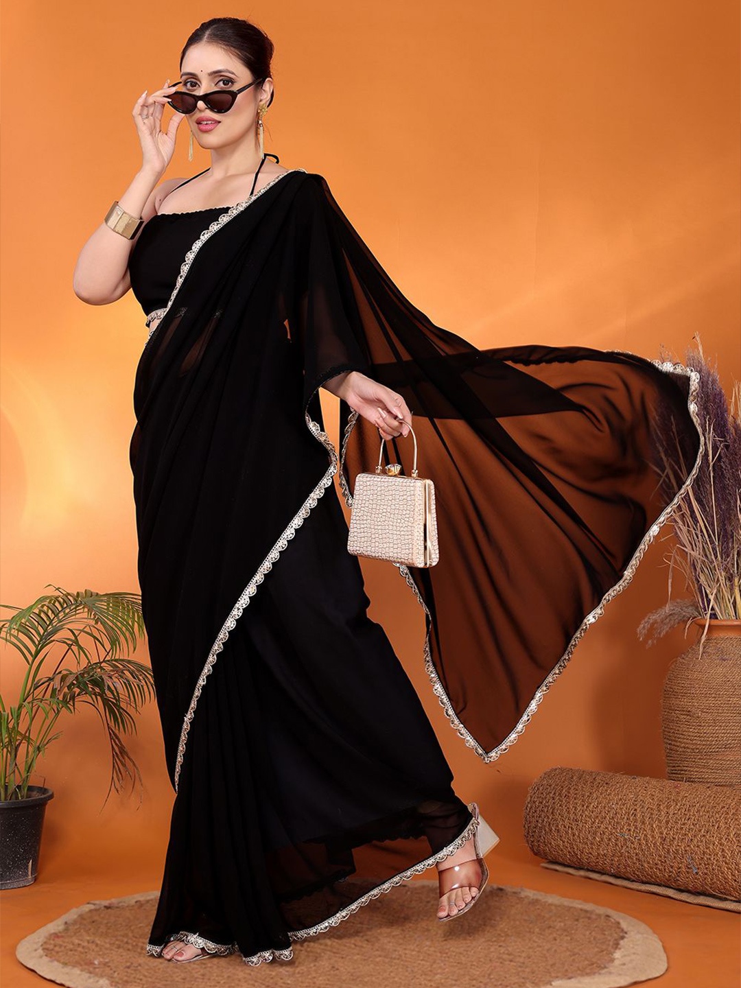 

FABMORA Embellished Pure Georgette Saree, Black