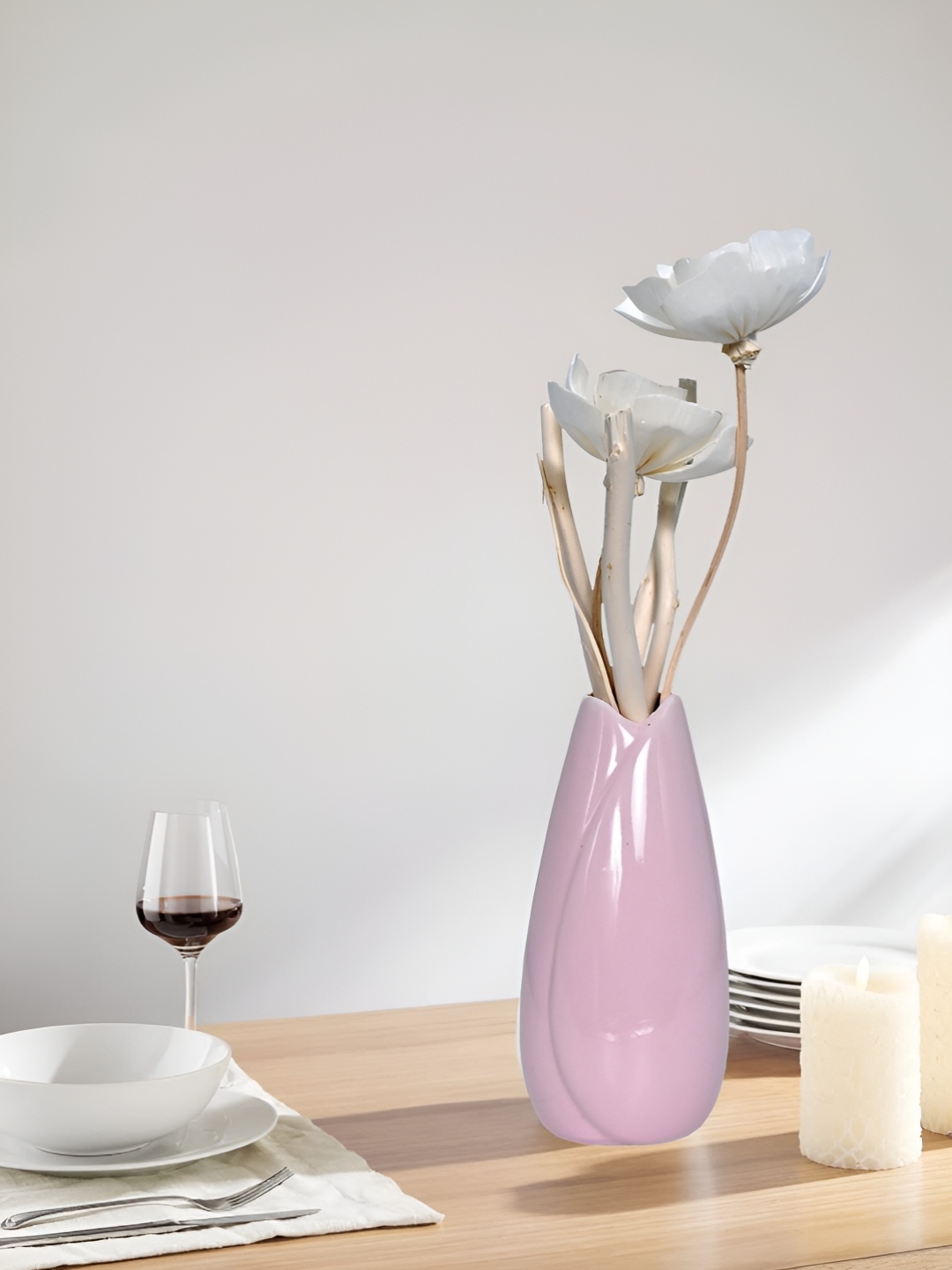 

Myntra Elegant Homes Purple Ceramic Textured FlowerVases