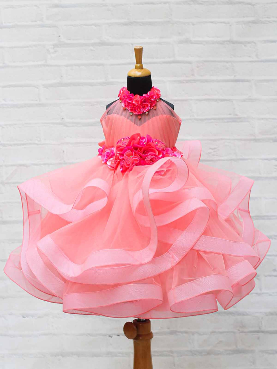 

Li & Li Girls Peach Halter Neck Twirled Couture Gown With Coral Pink Flower Embellishments