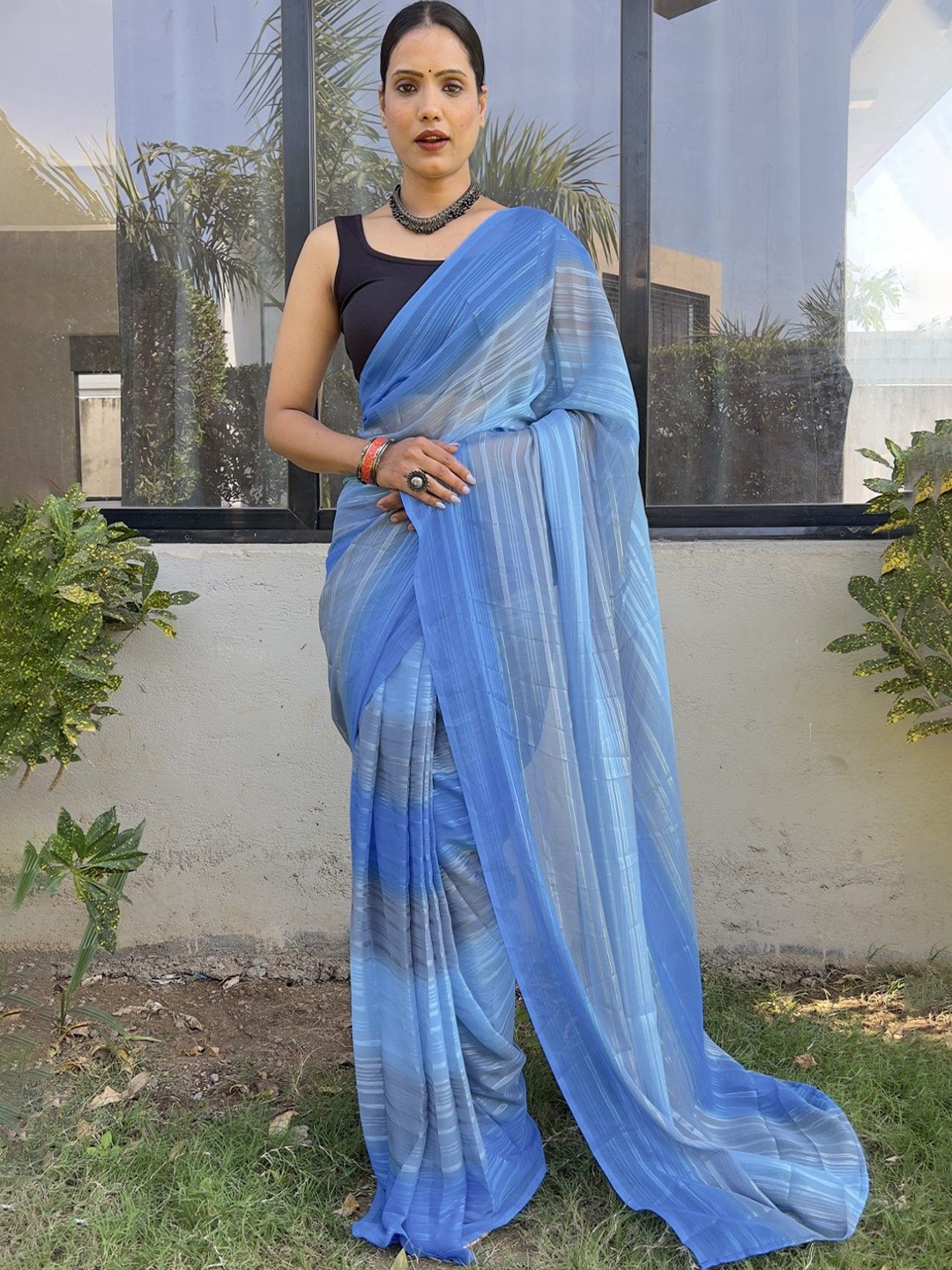 

Rangtulika Ethnics Striped Art Silk Ready to Wear Saree, Blue