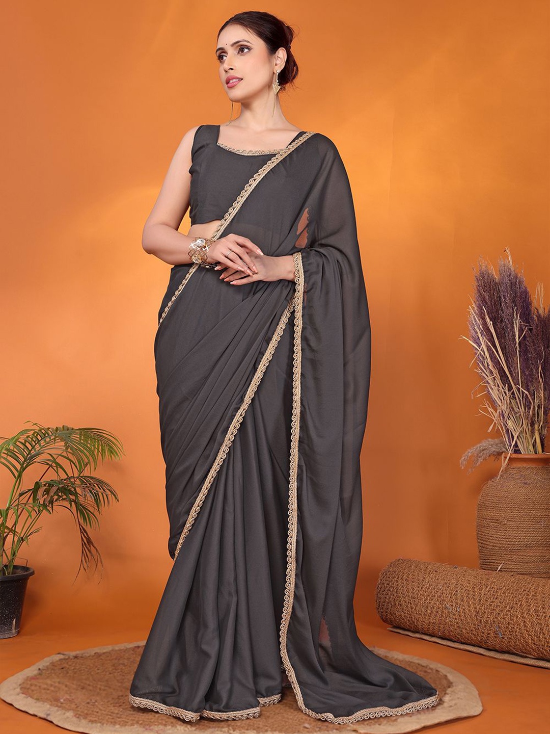 

FABMORA Embellished Sequinned Pure Georgette Saree, Grey